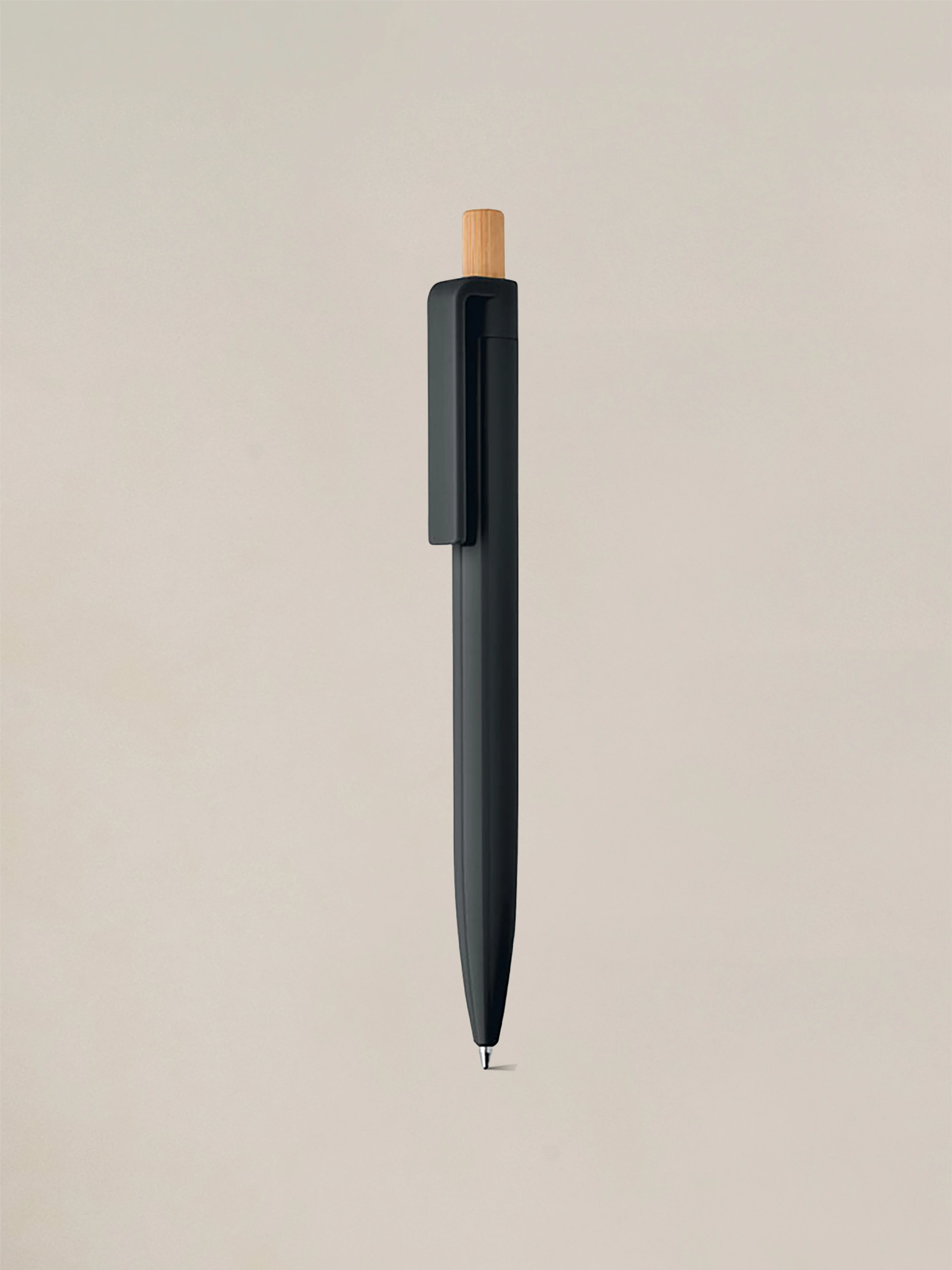 Eco-friendly ballpoint pen with a bamboo push button for a natural finish. A sustainable choice for everyday writing.