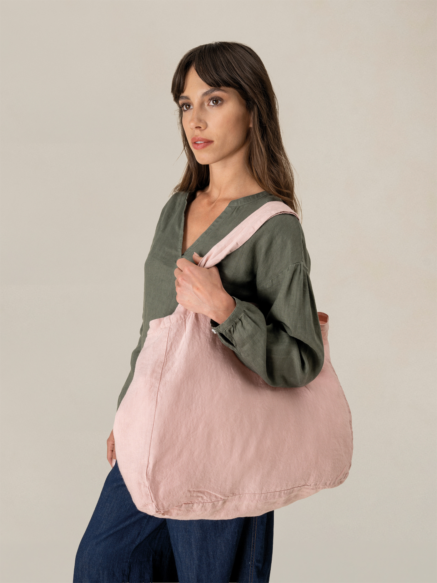 A premium-linen tote designed for everyday use, with generous space and a comfortable carry.