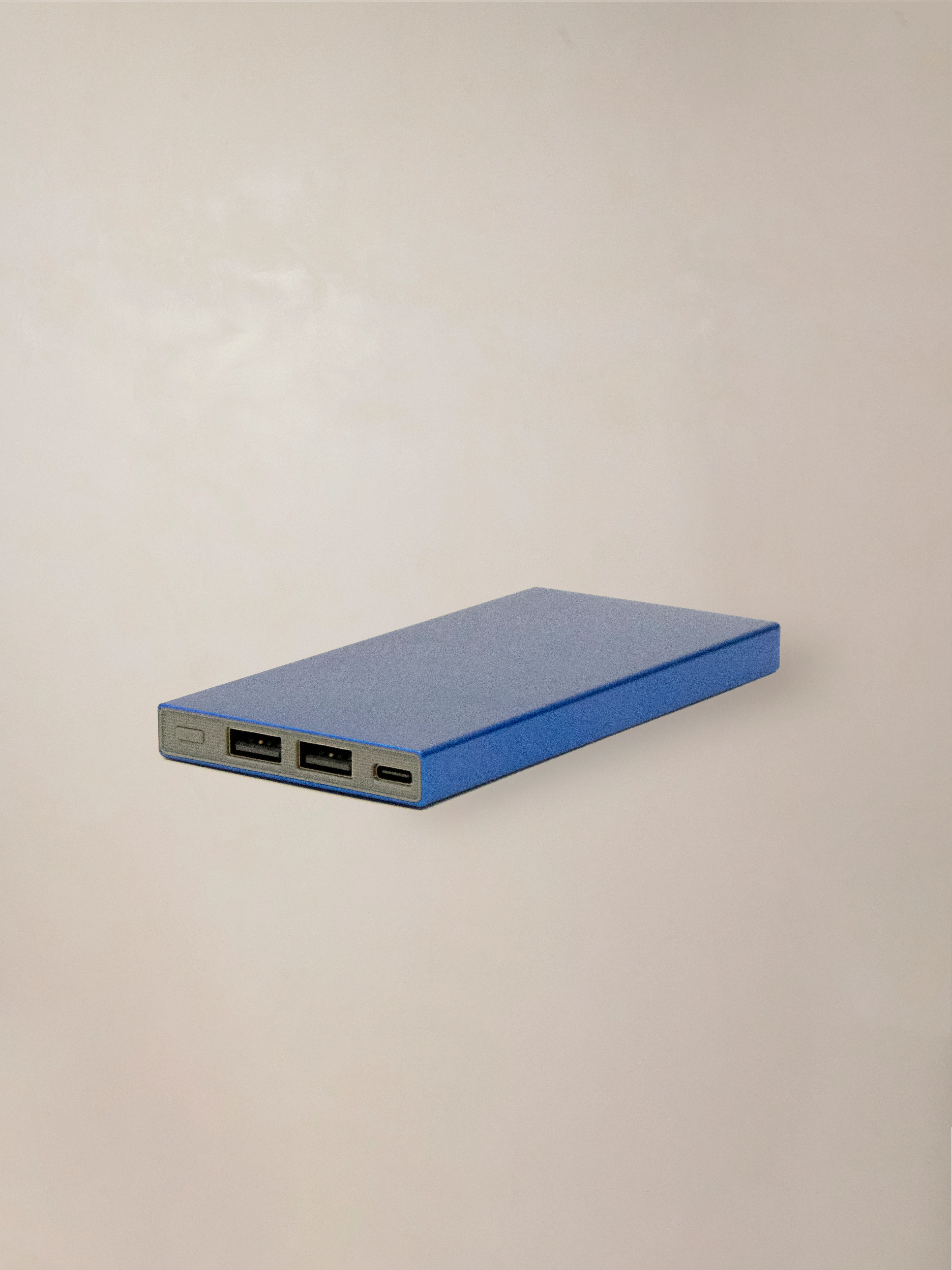 A power bank made entirely from recycled aluminum, blending clean design with responsible materials.