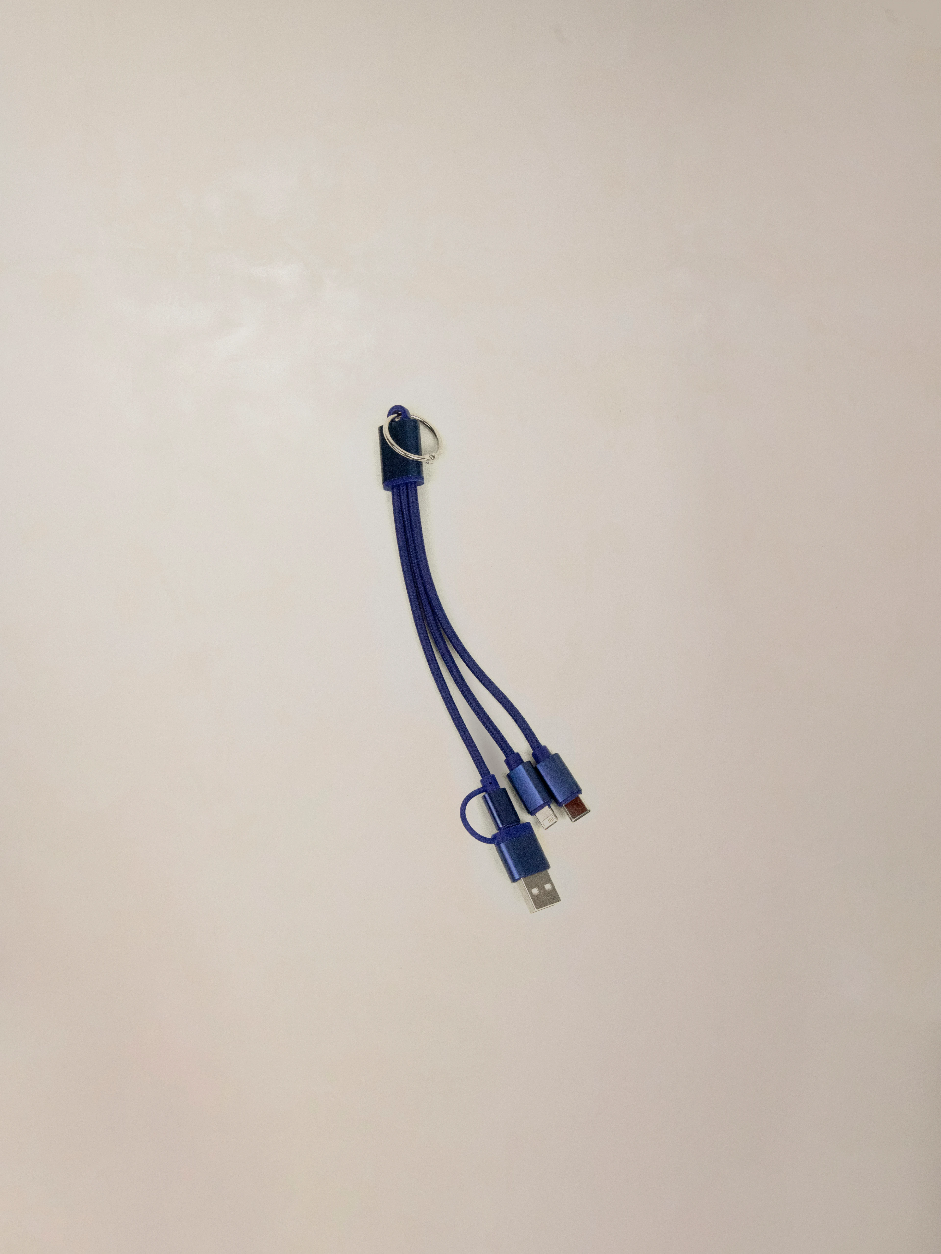 Multi-connector charging cable compatible with all major smartphones, an everyday essential for charging at home, in the office, or on the go.