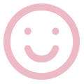 Ein einfaches Smiley-Gesicht mit einem Lächeln in einem pinkfarbenen Kreis.