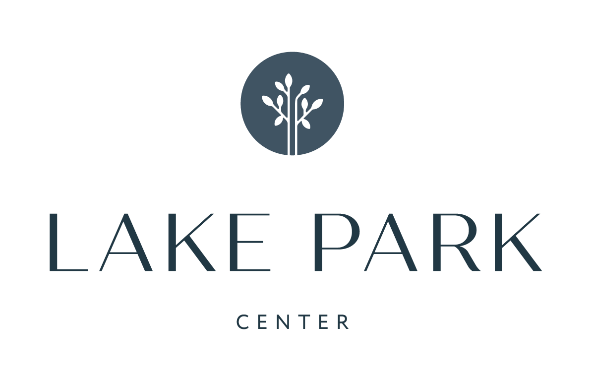Logo featuring a stylized tree inside a circle above the text 'Lake Park Center'.