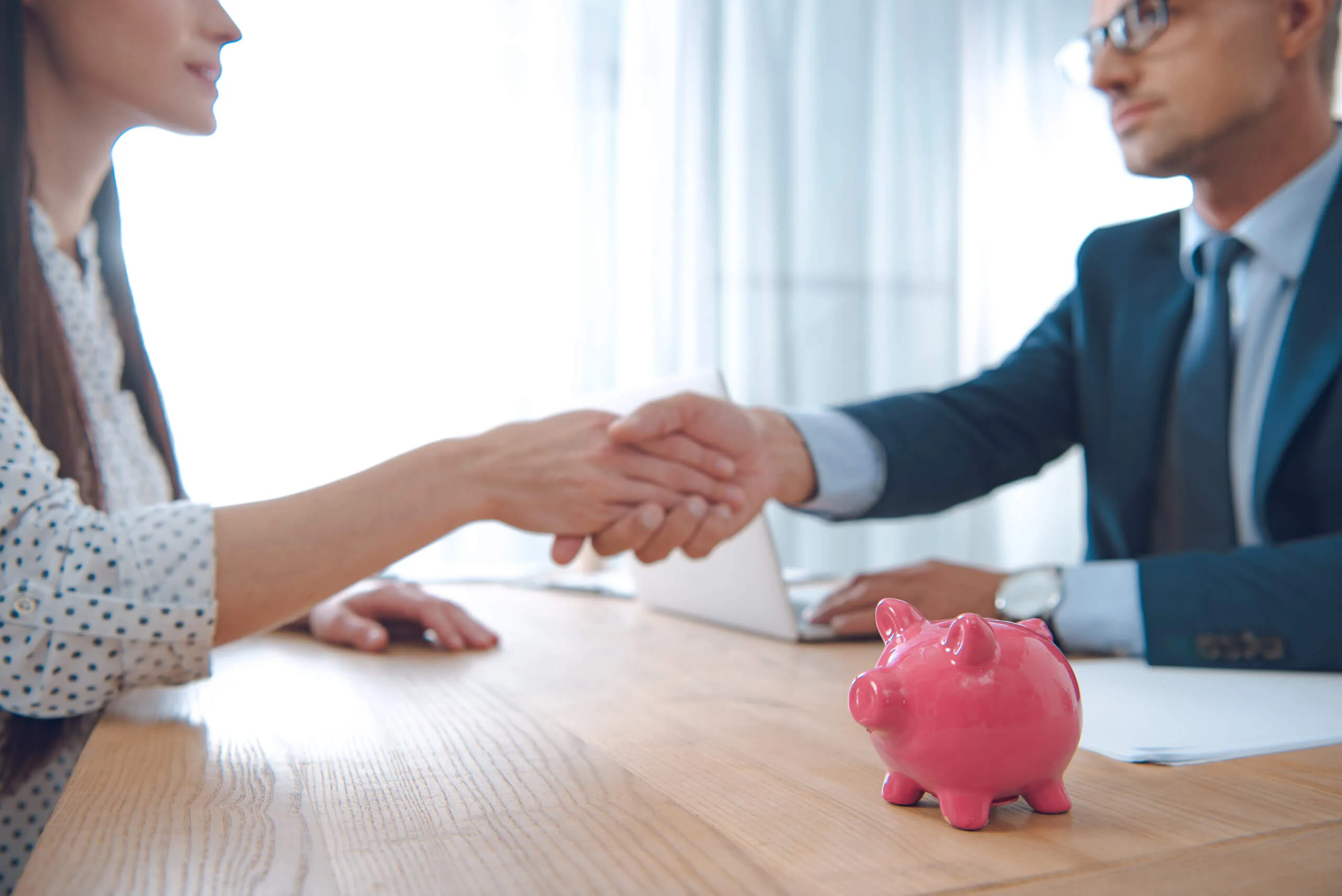 Client and lender shaking hands
