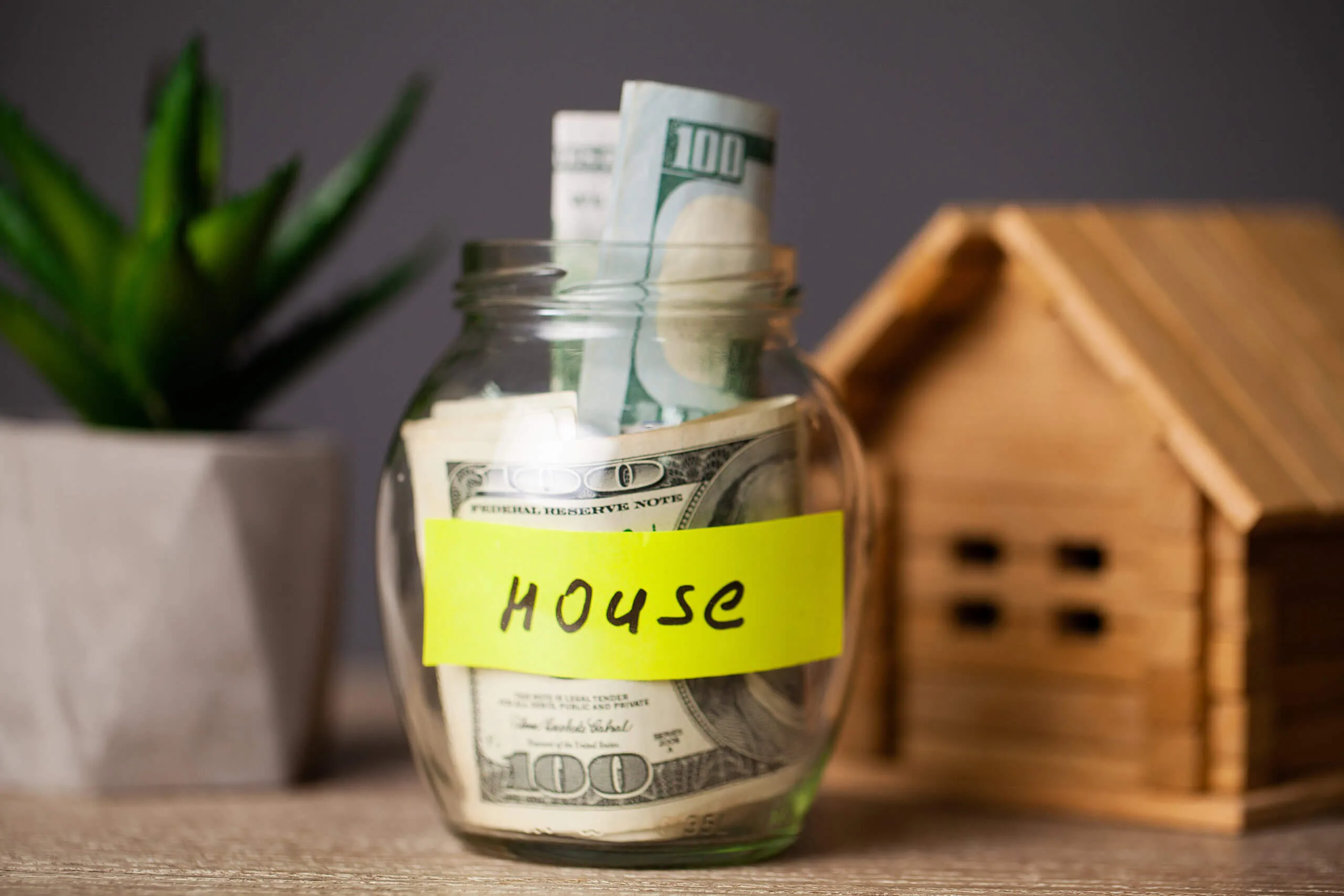 Jar full of money for savings for house