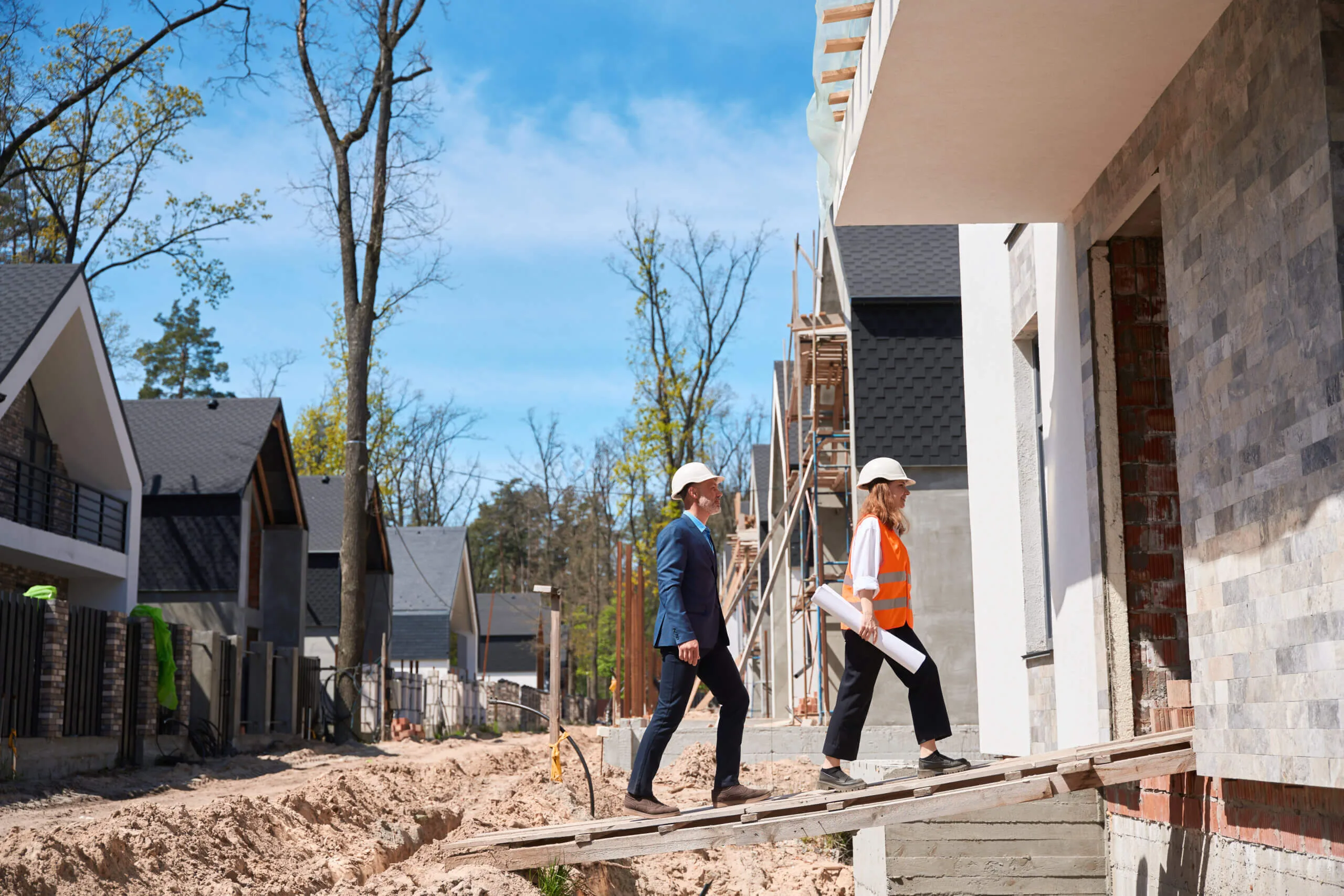 Builders entering the construction site
