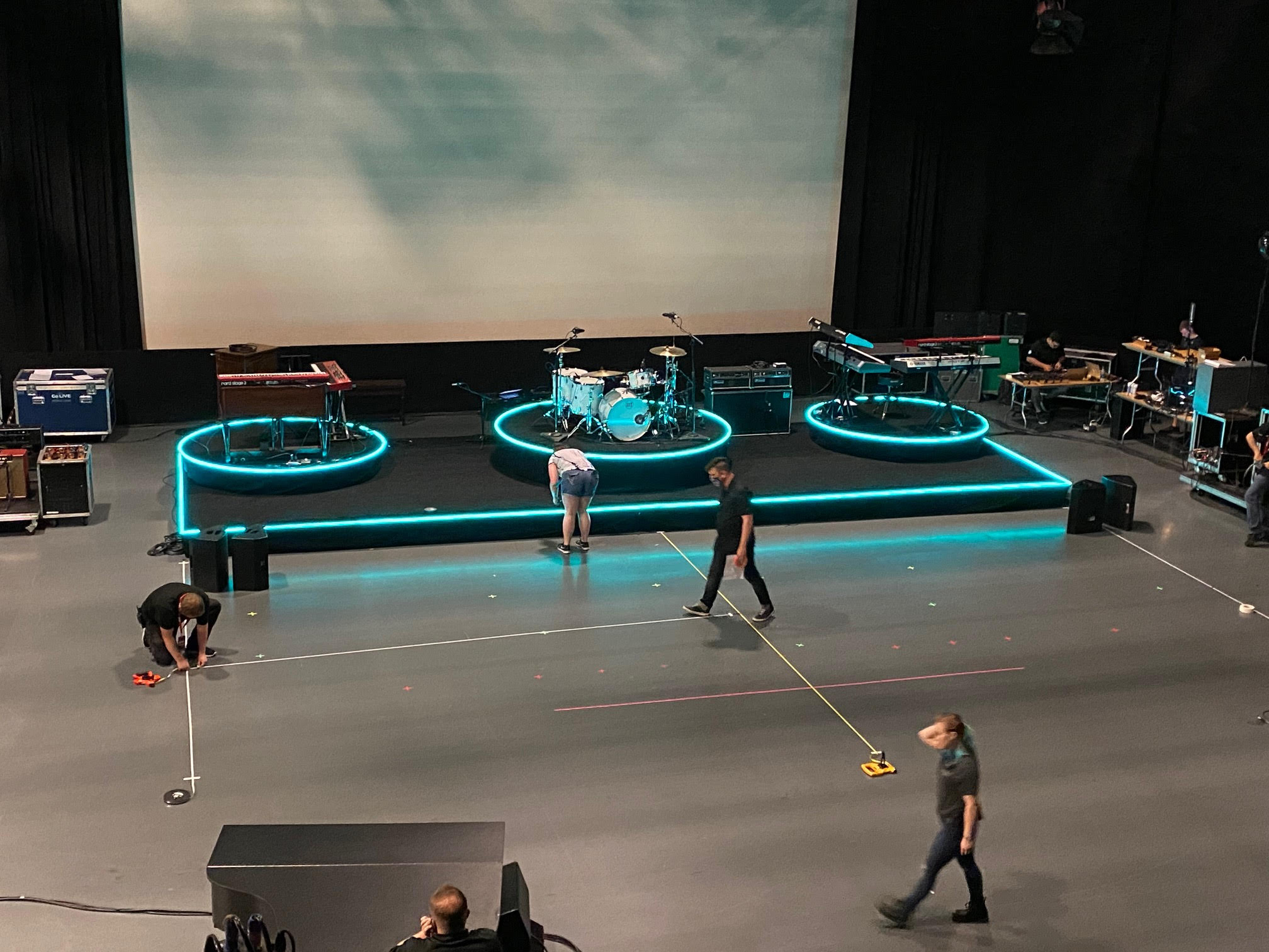 This picture is really important.  This was the first usage of our Flexlight stage fixture.  There is no custom fabricated product whatsoever to accomplish the outlining of the circular risers.  This is a standard fixture in our rental inventory that literally becomes any shape the end user needs.  Installation time; 45 minutes!