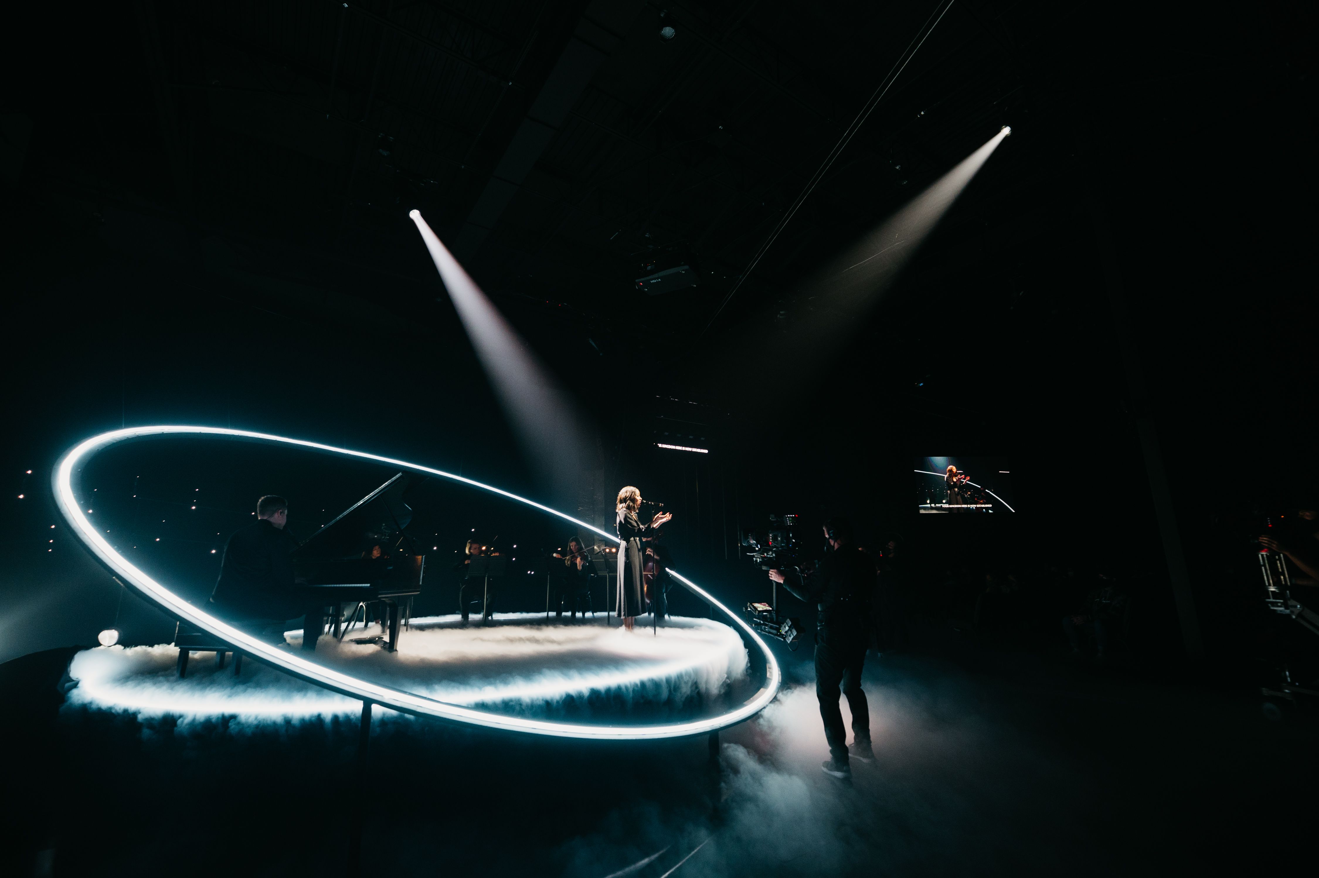 This project went from a querey to completed in less than a week.  While the oval structural compenent was fabricated, everything else came directly from our rental stock.  The 20' diameter stage saw one of the first usages of our new FLEXIBLE lighting fixtures!  Installation is super simple!  Who else can do this?!