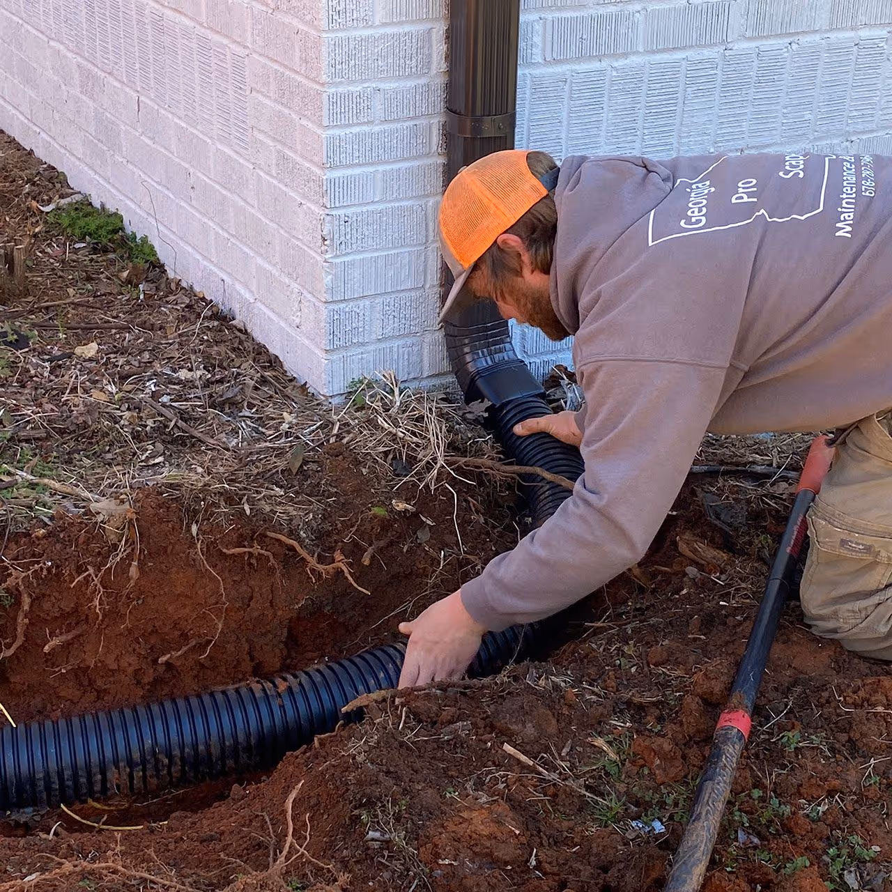 Gutter drain installation by Georgia Pro Scapes