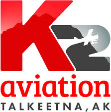 K2 Aviation logo with a stylized red K, gray 2, airplane silhouette, and text Talketna, AK.