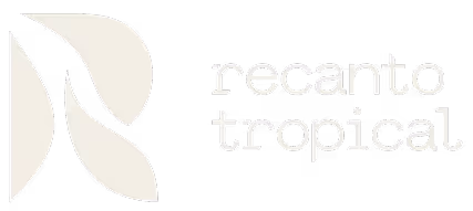 Stylized leaf logo with the text recanto tropical in lowercase letters.