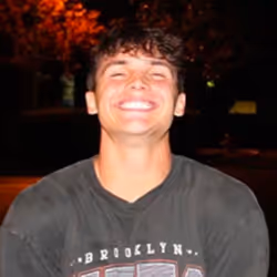 Tristin Duncan author headshot, picture of him smiling