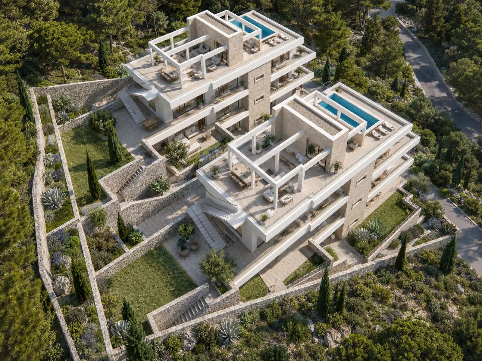 Aerial view of contemporary apartment complex with rooftop pools and surrounding greenery