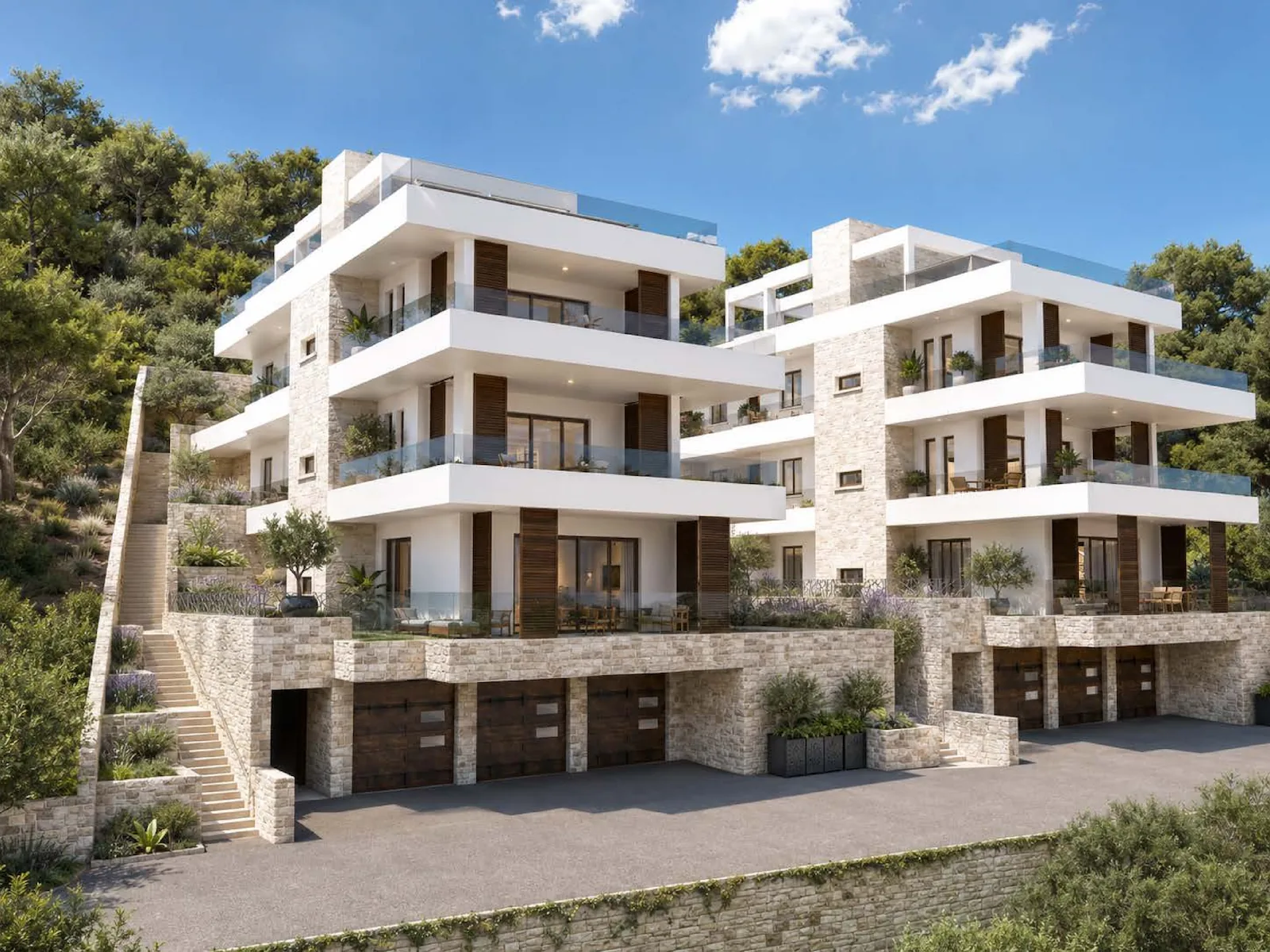 Modern white residential apartment building exterior with balconies and parking area