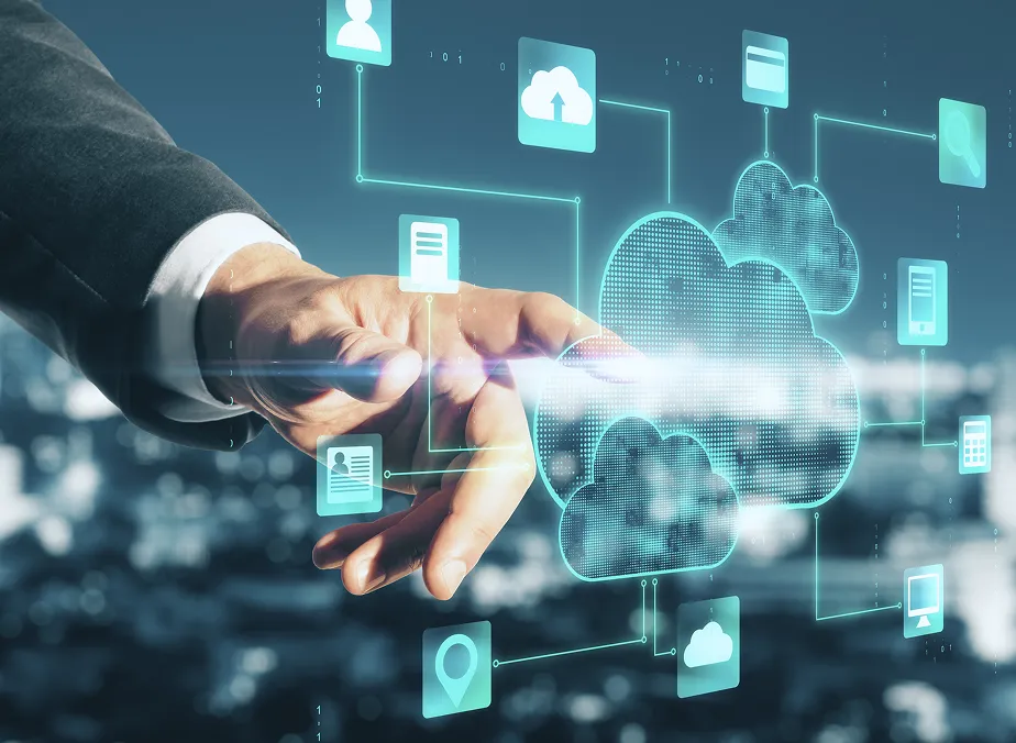 Hand of a person in a suit interacting with digital cloud computing icons and symbols.