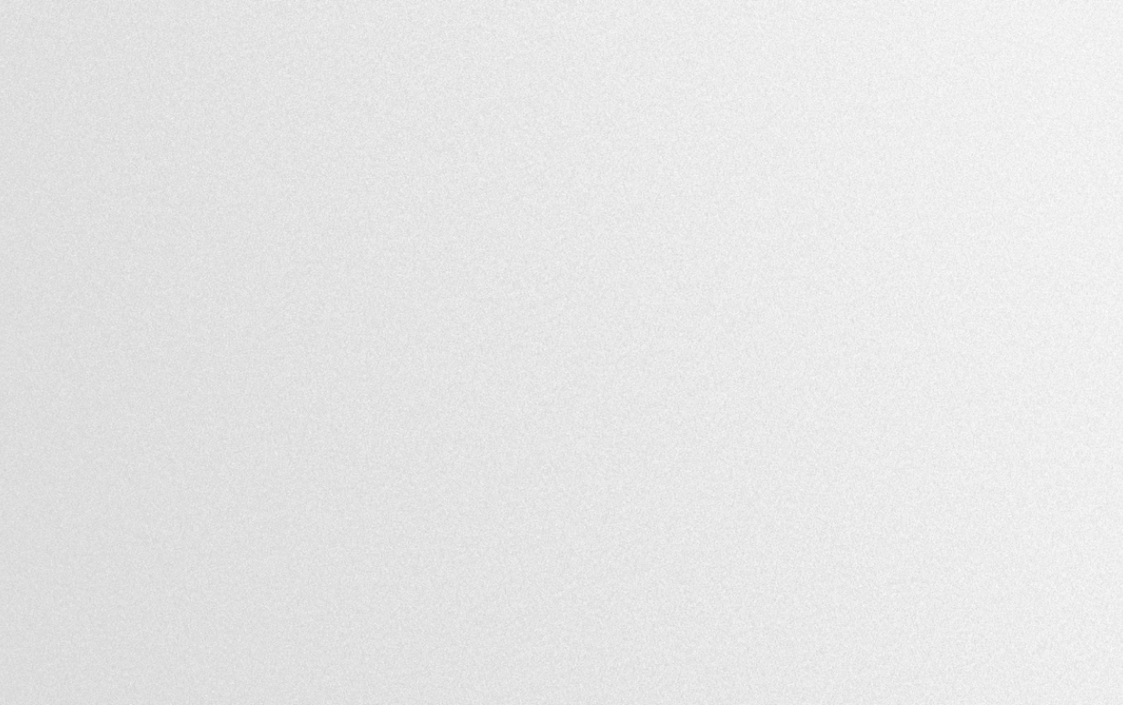 Horizontal gradient textured background transitioning from black on the left to white on the right.