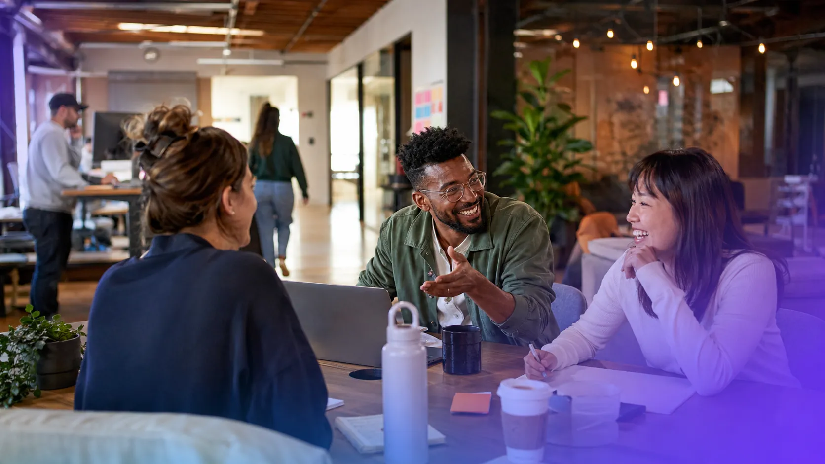 Workplace transparency blog header — employees in open conversation at work, illustrating communication, trust, and cultural transparency for HR leaders