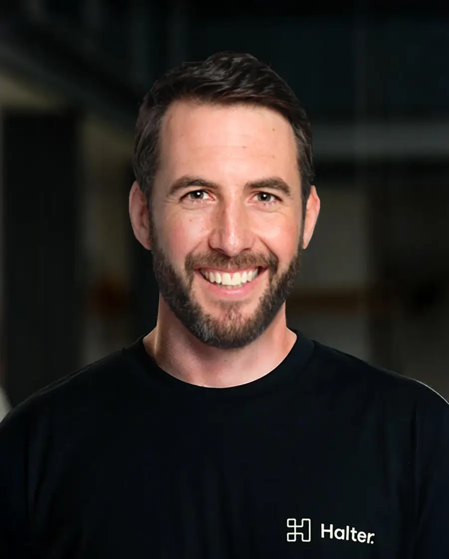 Scott Maud — a man with short dark hair and a trimmed beard, wearing a black Halter t-shirt.
