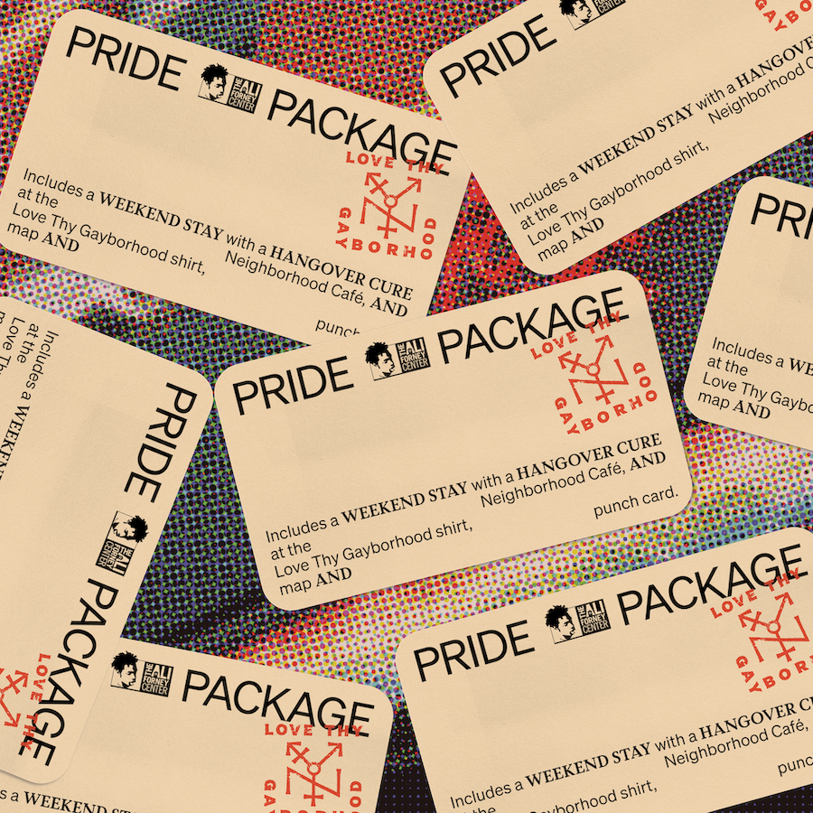 Coupon cards sprawled out on a table, cards are titled 'pride package'.
