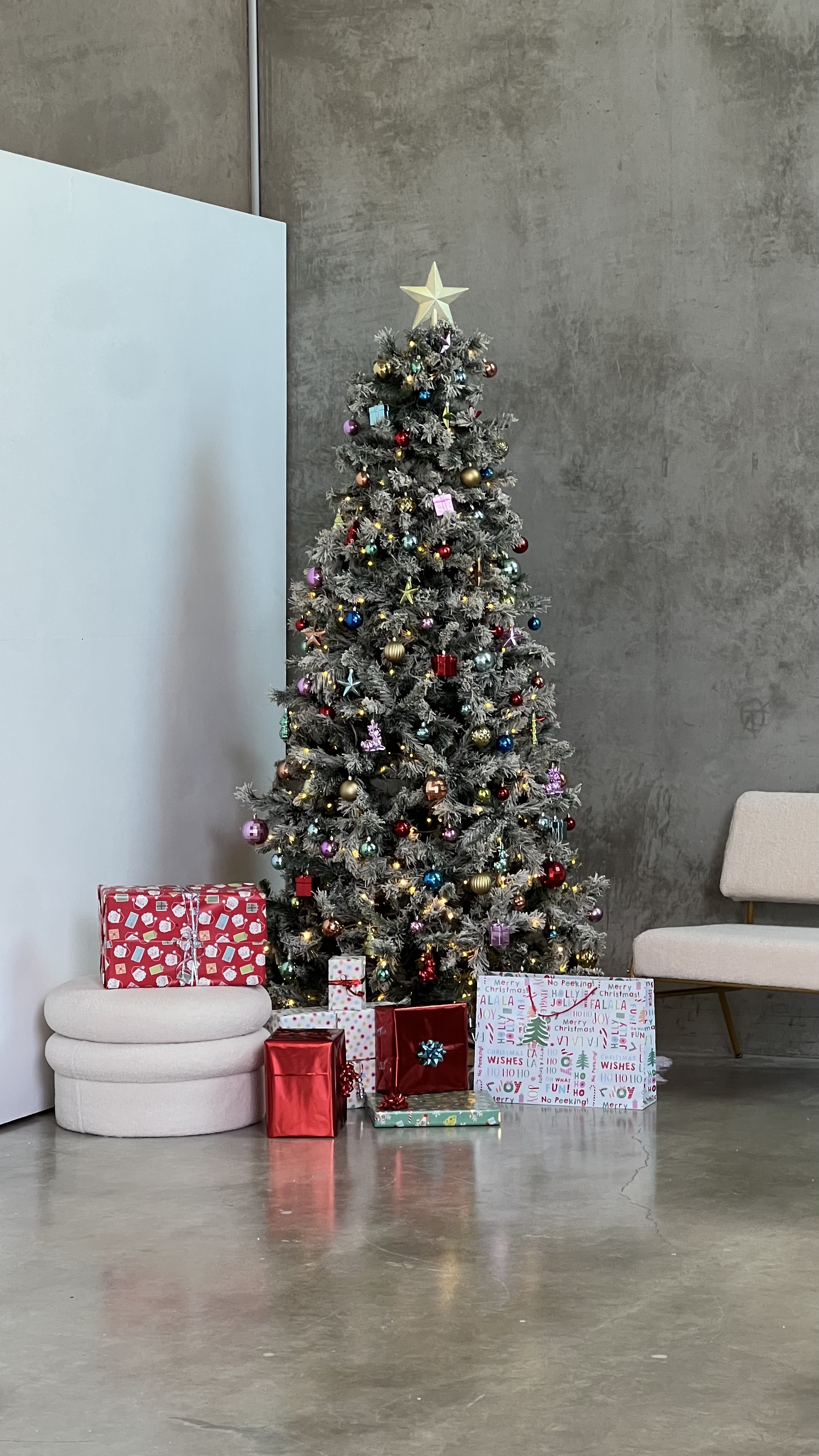Image of Christmas tree and presents in foreground