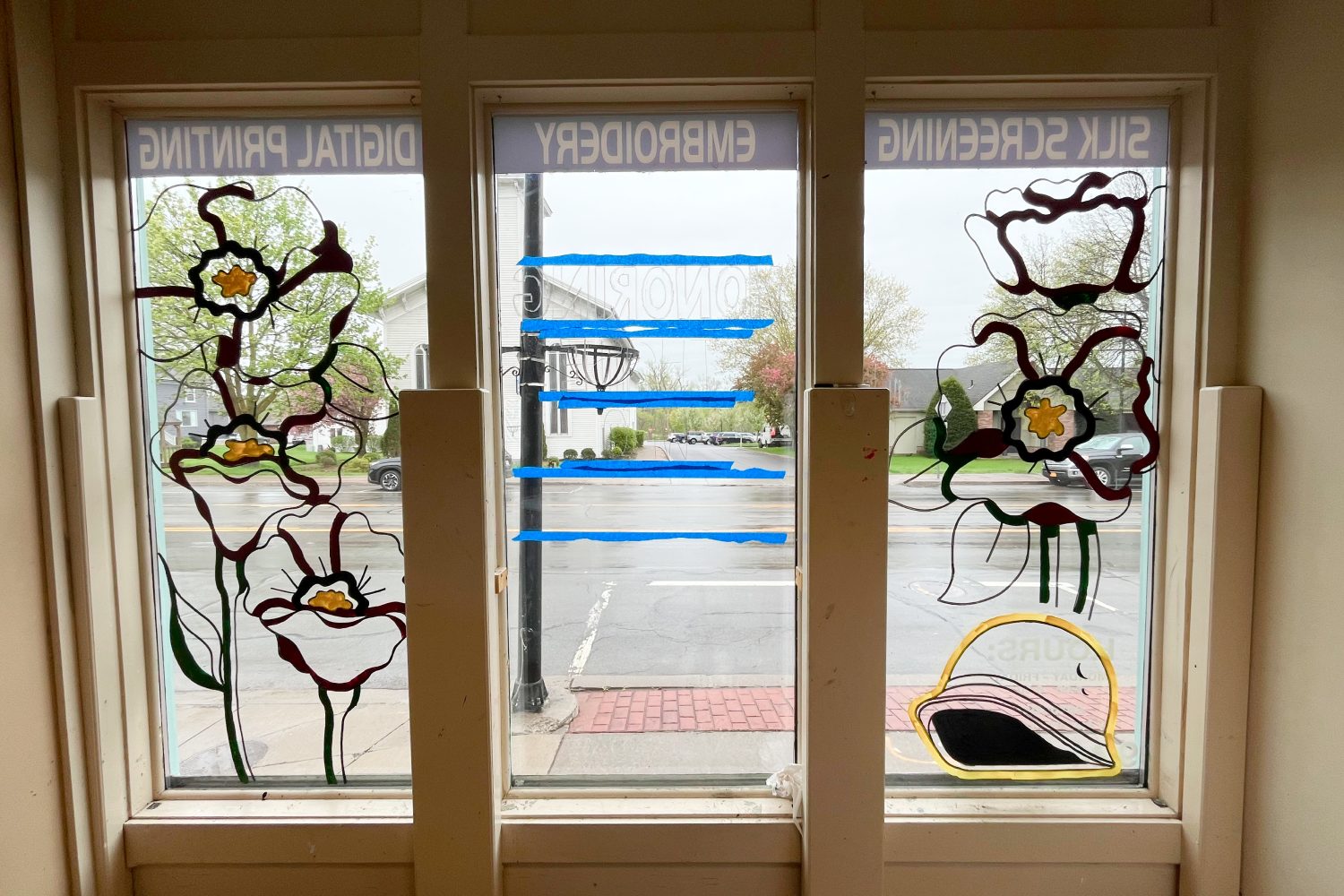Poppies outlined in black, no paint yet.