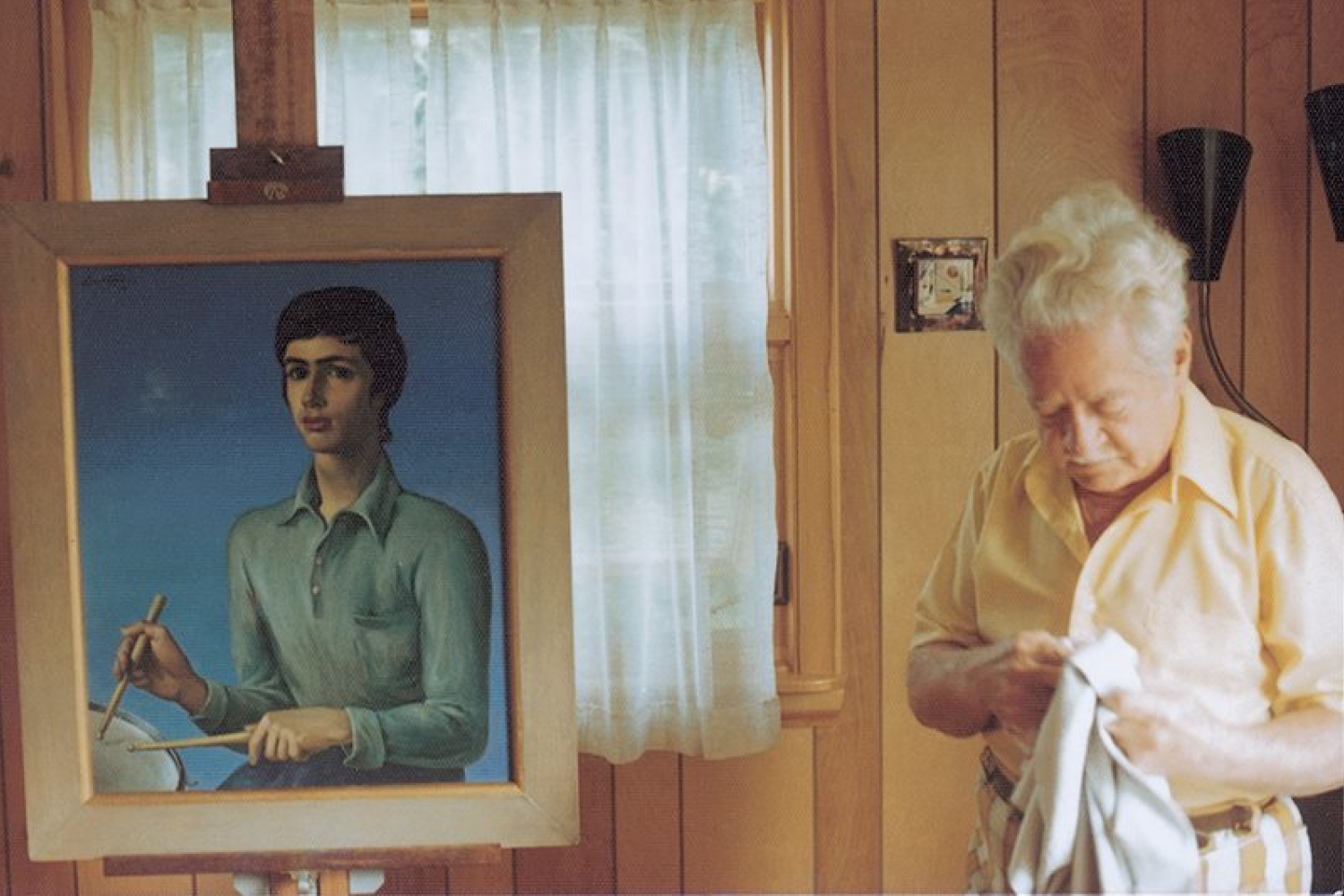 Photo of Antonio Gattorno finishing up Francois Gallant's portrait in 1975.