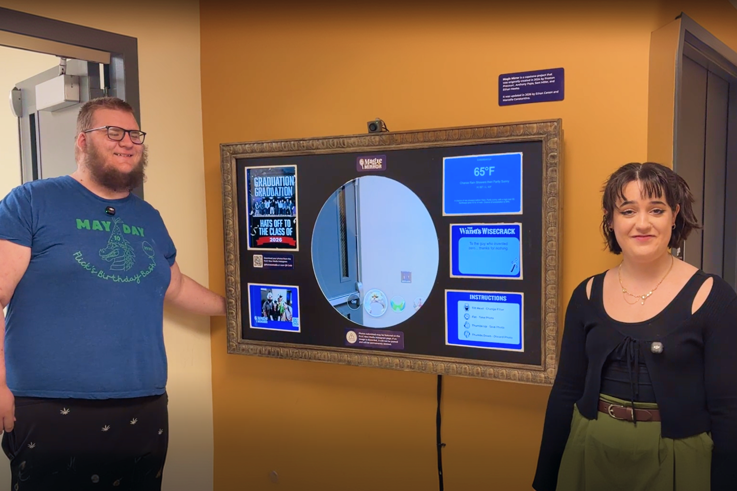 Marcella and Ethan standing next to finished Magic Mirror.