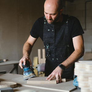 A man sanding maching