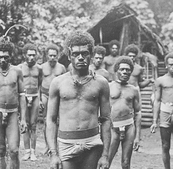 A group of men standing next to each other.