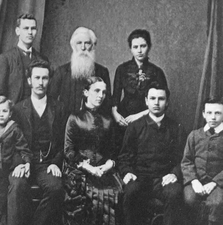 A black and white photo of a group of people.