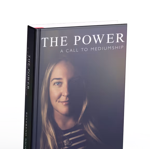 Book titled 'The Power: A Call to Mediumship' featuring a portrait of a woman with long blonde hair on the cover.