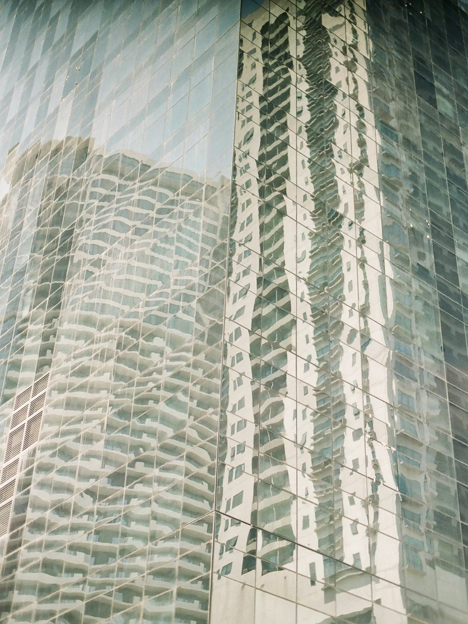 skyline of modern office towers: NABERS is widely adopted for offices and tenants that reduce waste at work can improve NABERS ratings.