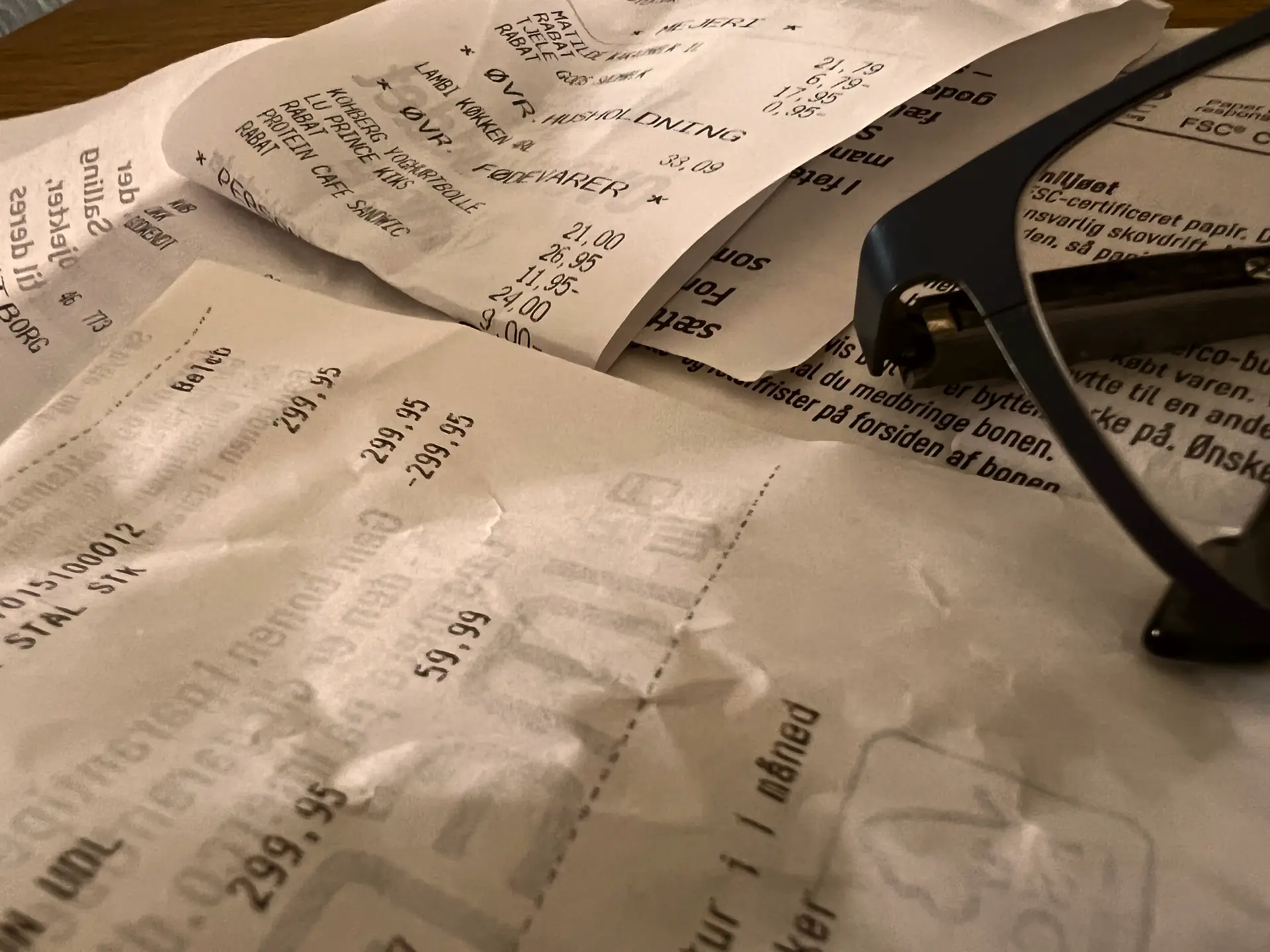 A pile of bills on a table