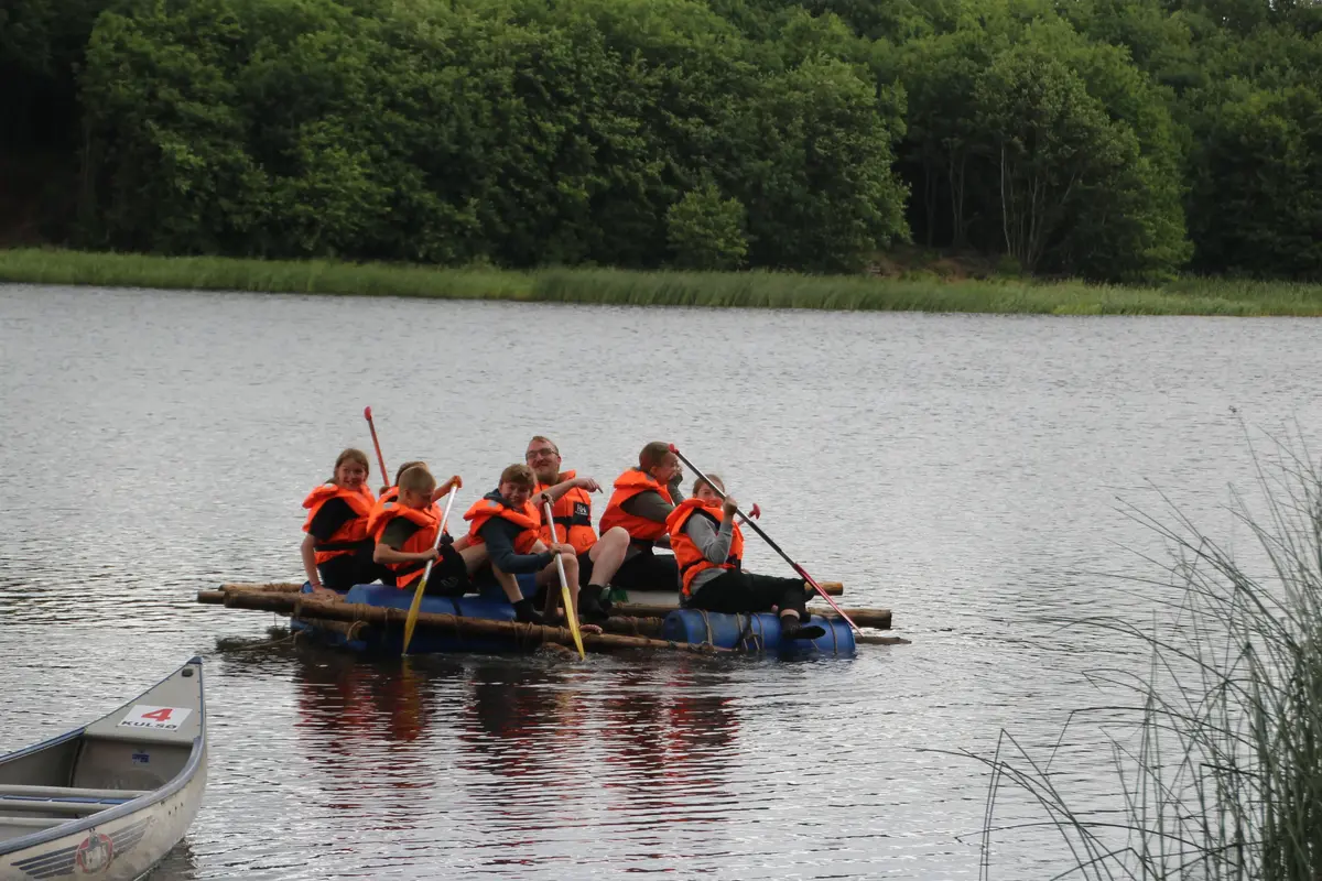 A group of kids on a raft