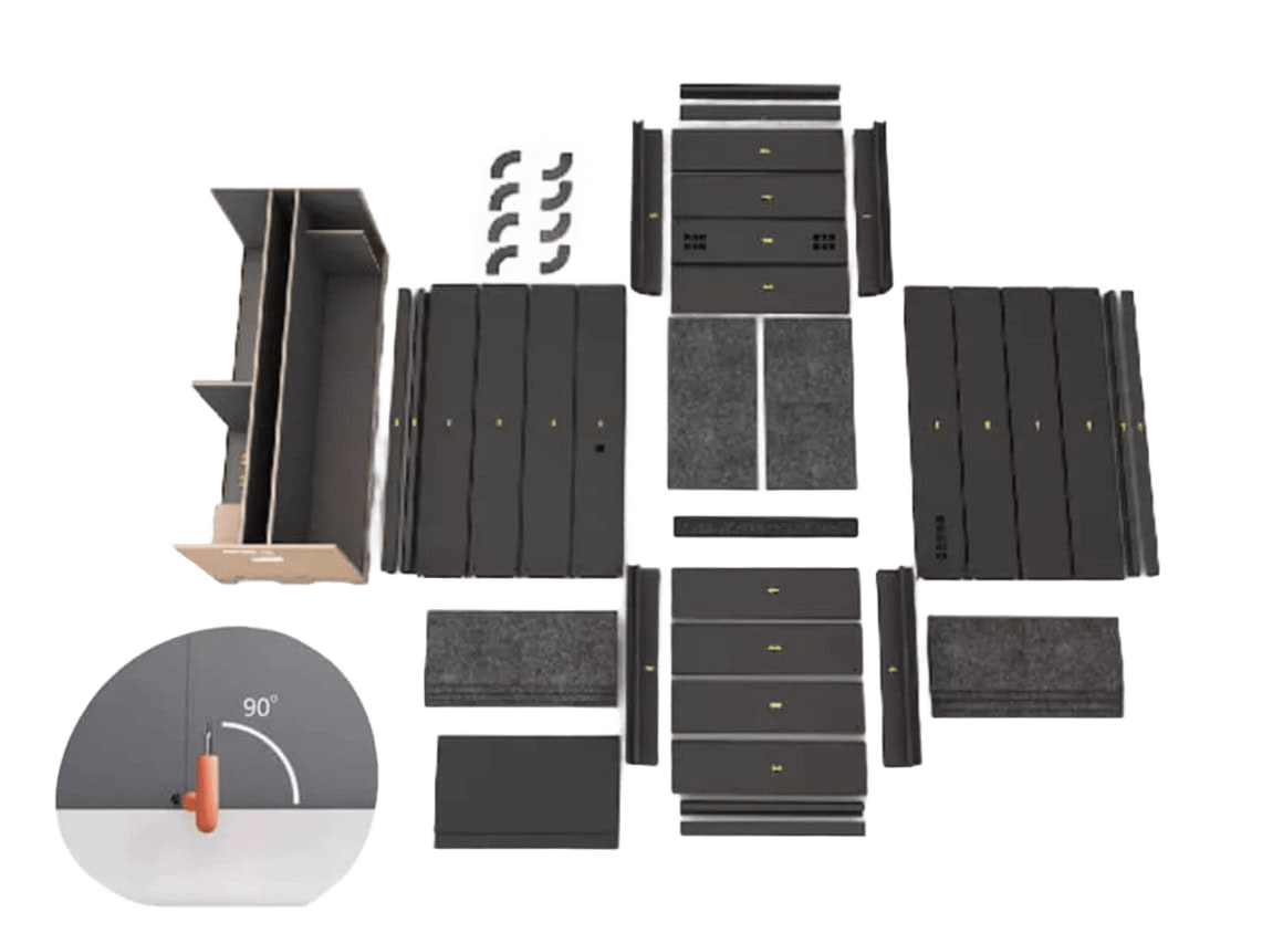 Compact private workspace booth with cushioned seat, small corner desk, and built-in power outlets.