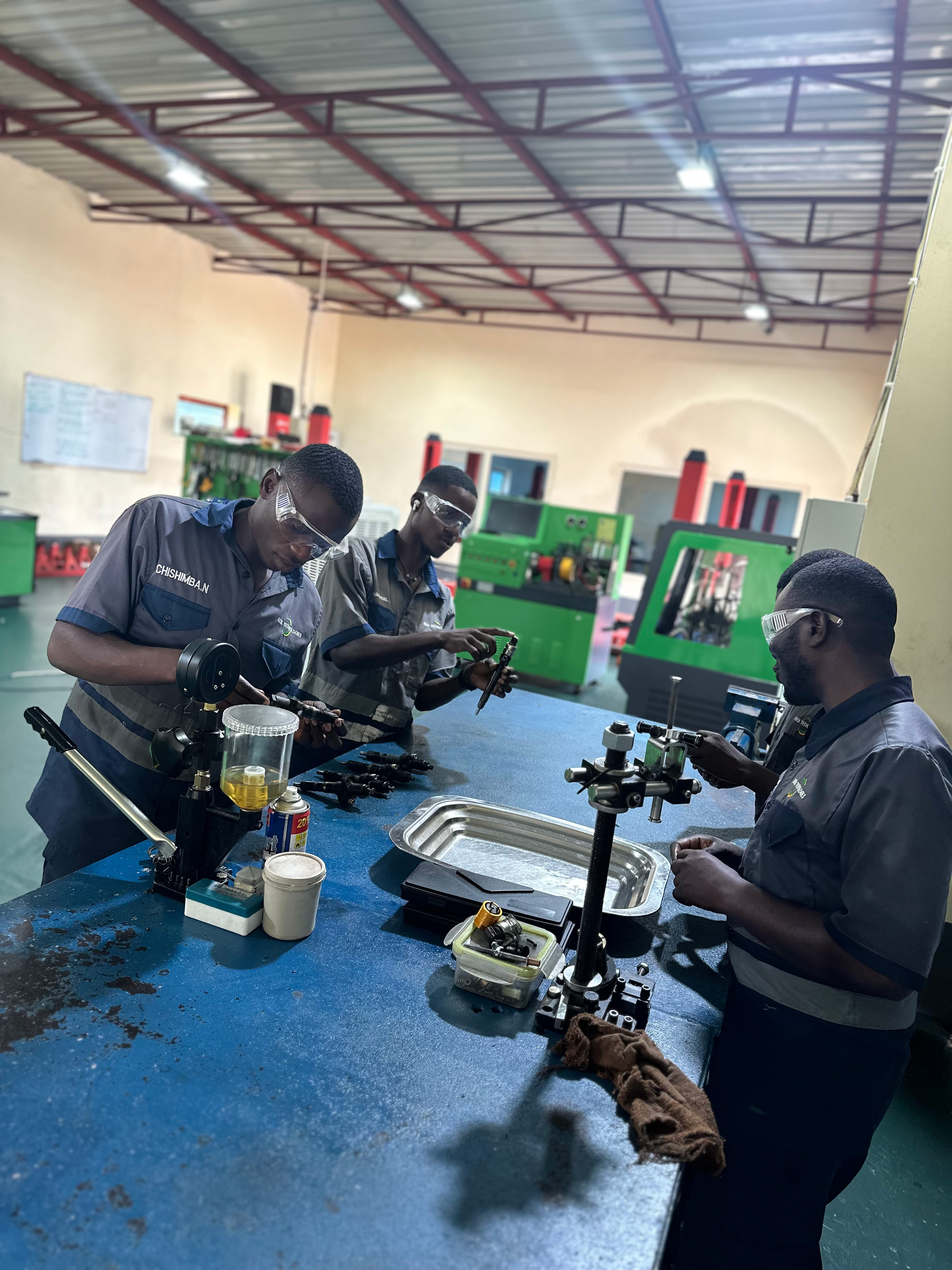 image of maintenance crew working on aircraft