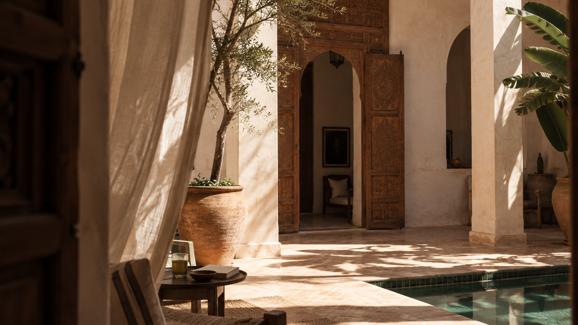 Fresh mint tea being carried through a quiet Moroccan interior.