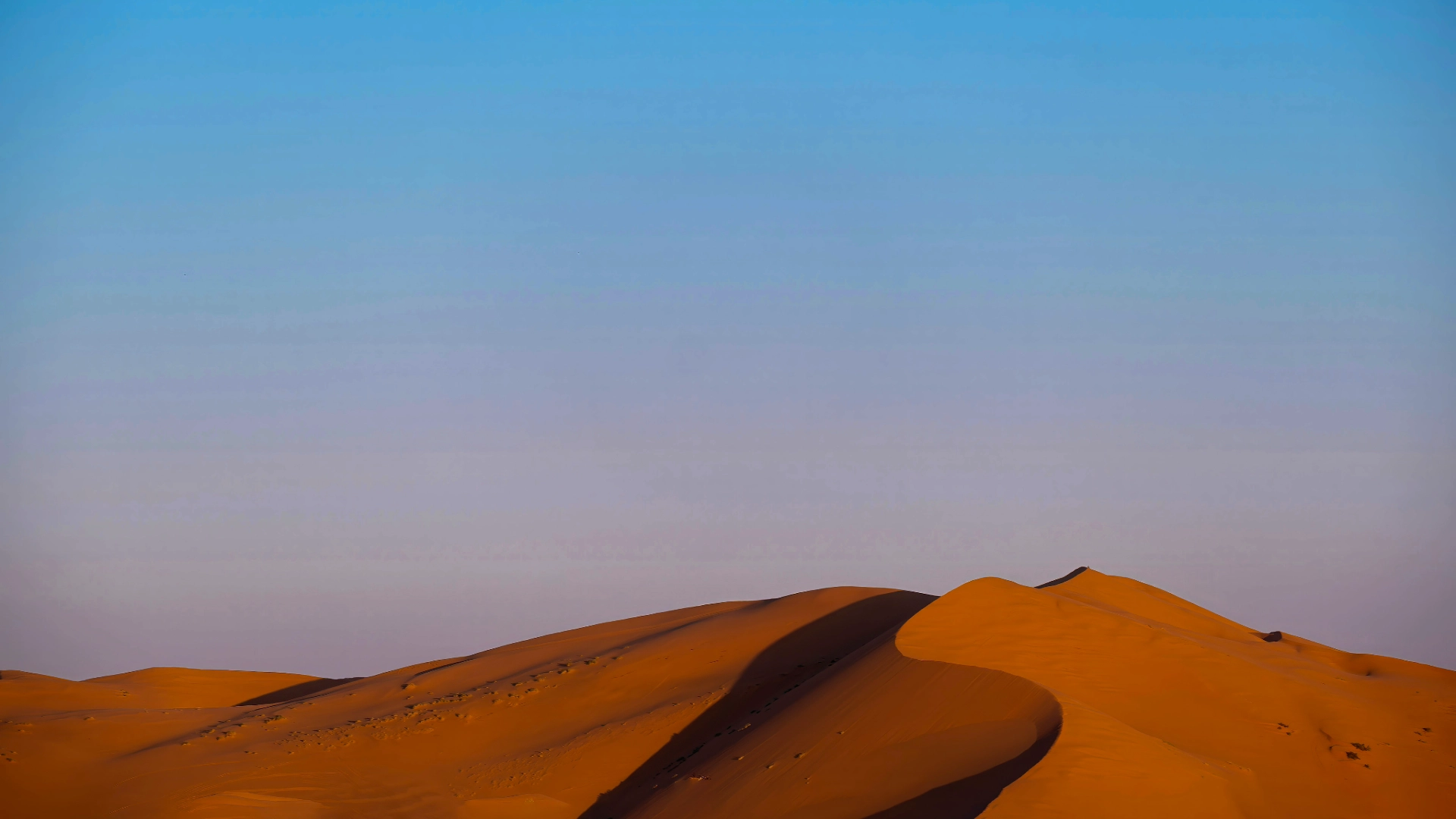 Erg Chebbi dunes in the quiet first light of morning, Morocco