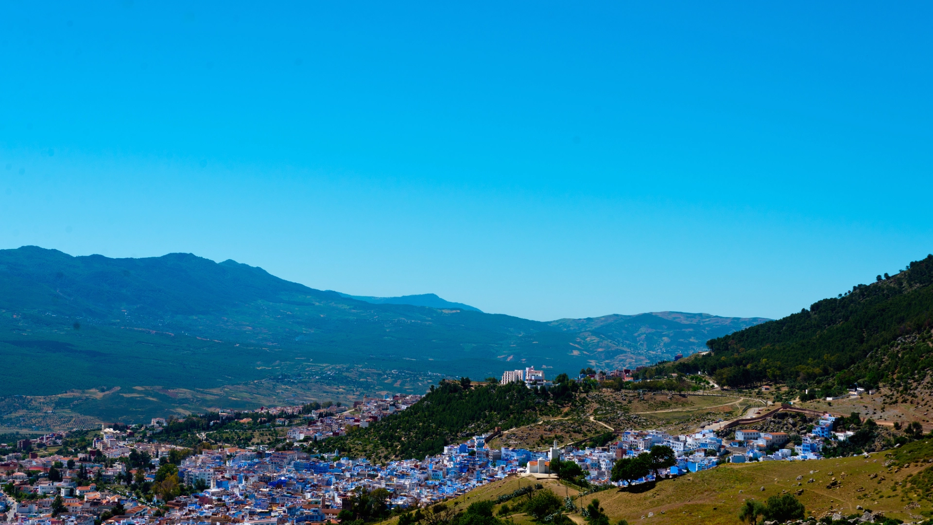 Chefchaouen Morocco blue medina mountains evening