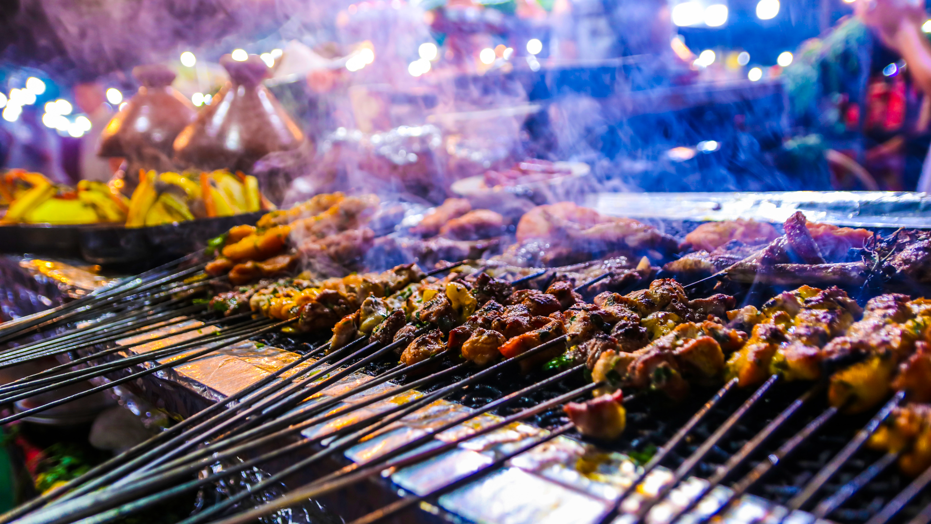 Jemaa el Fna Marrakech food stalls cooking smoke night