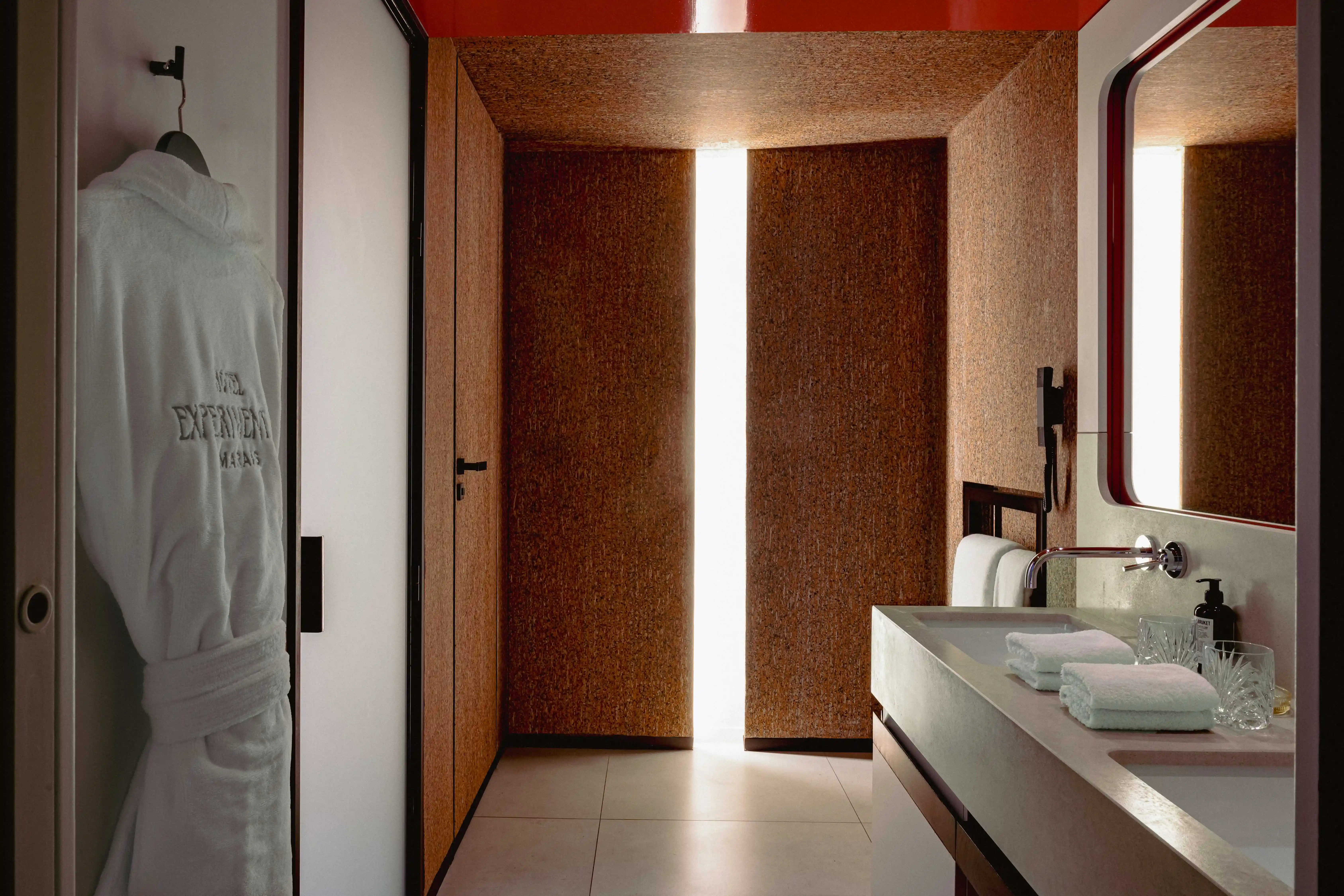 Elegant bathroom at Experimental Marais, featuring modern design and luxury amenities.