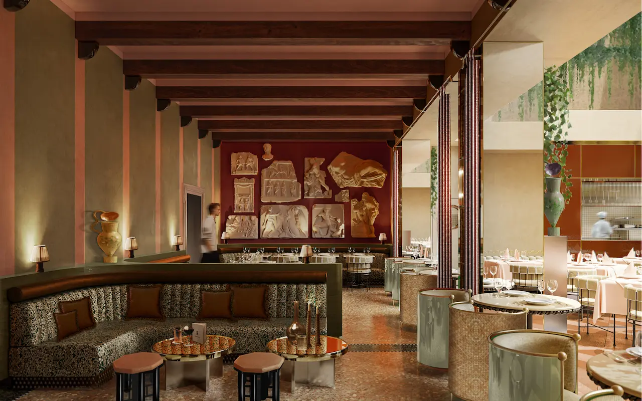Restaurant interior at Experimental Roma with sculptural wall artworks.