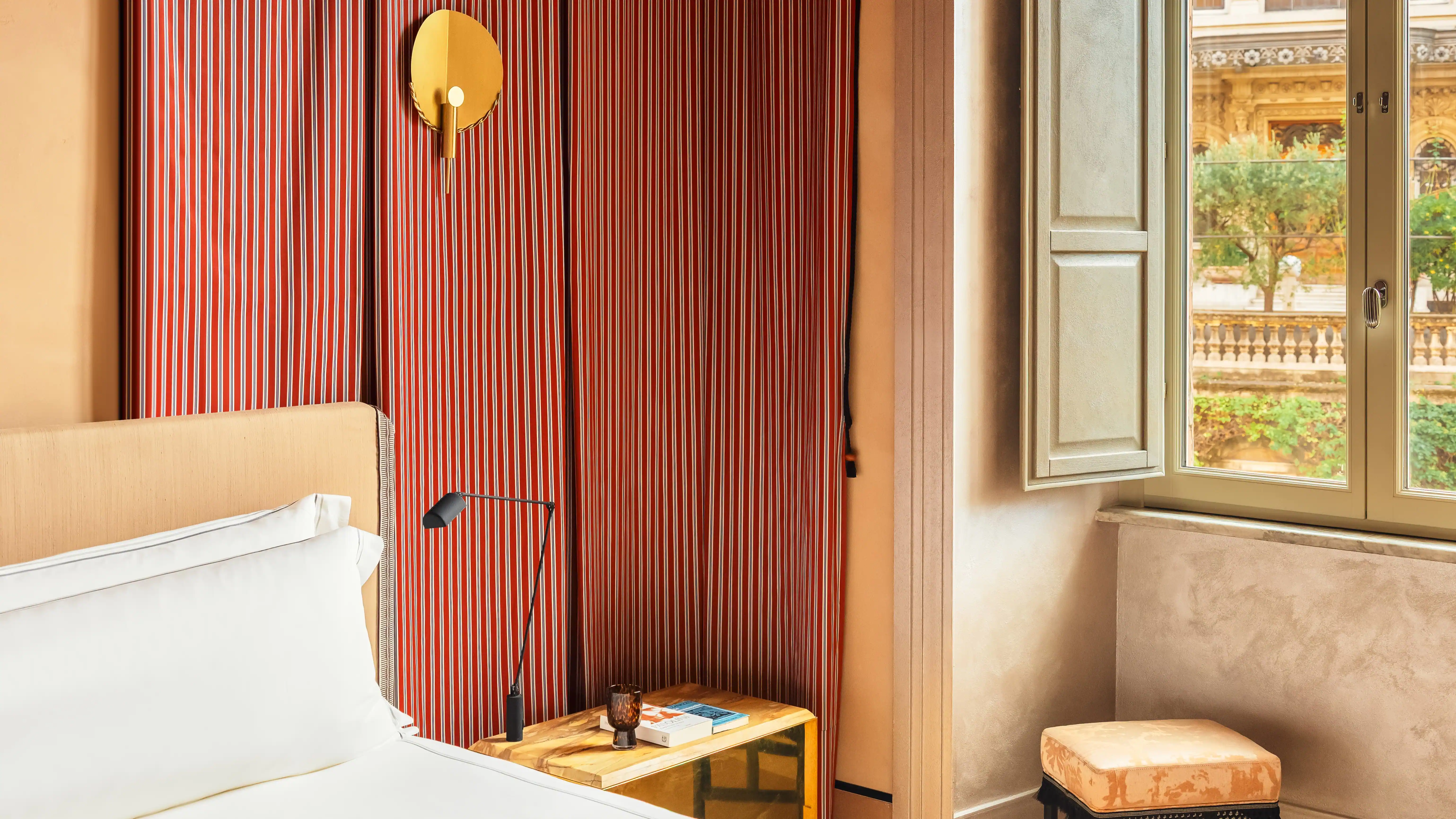 Stylish and cozy hotel rooms at Hotel Experimental Roma, offering comfort and elegance in the heart of Rome.