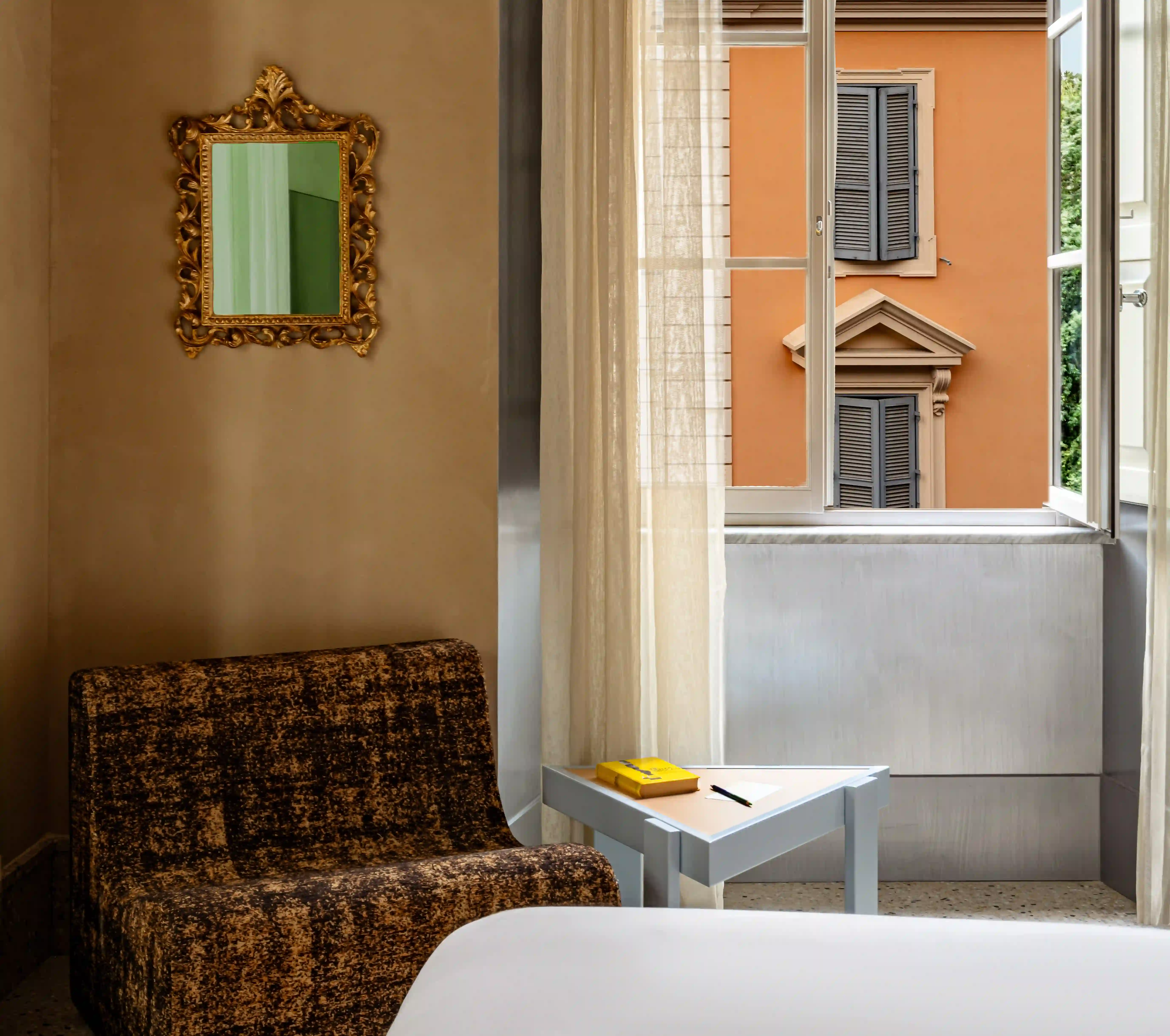 Elegant hotel room interior at Experimental Roma