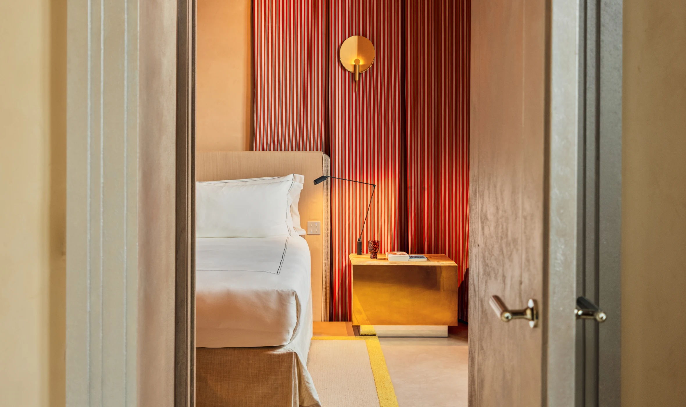 Elegant hotel room interior at Experimental Roma