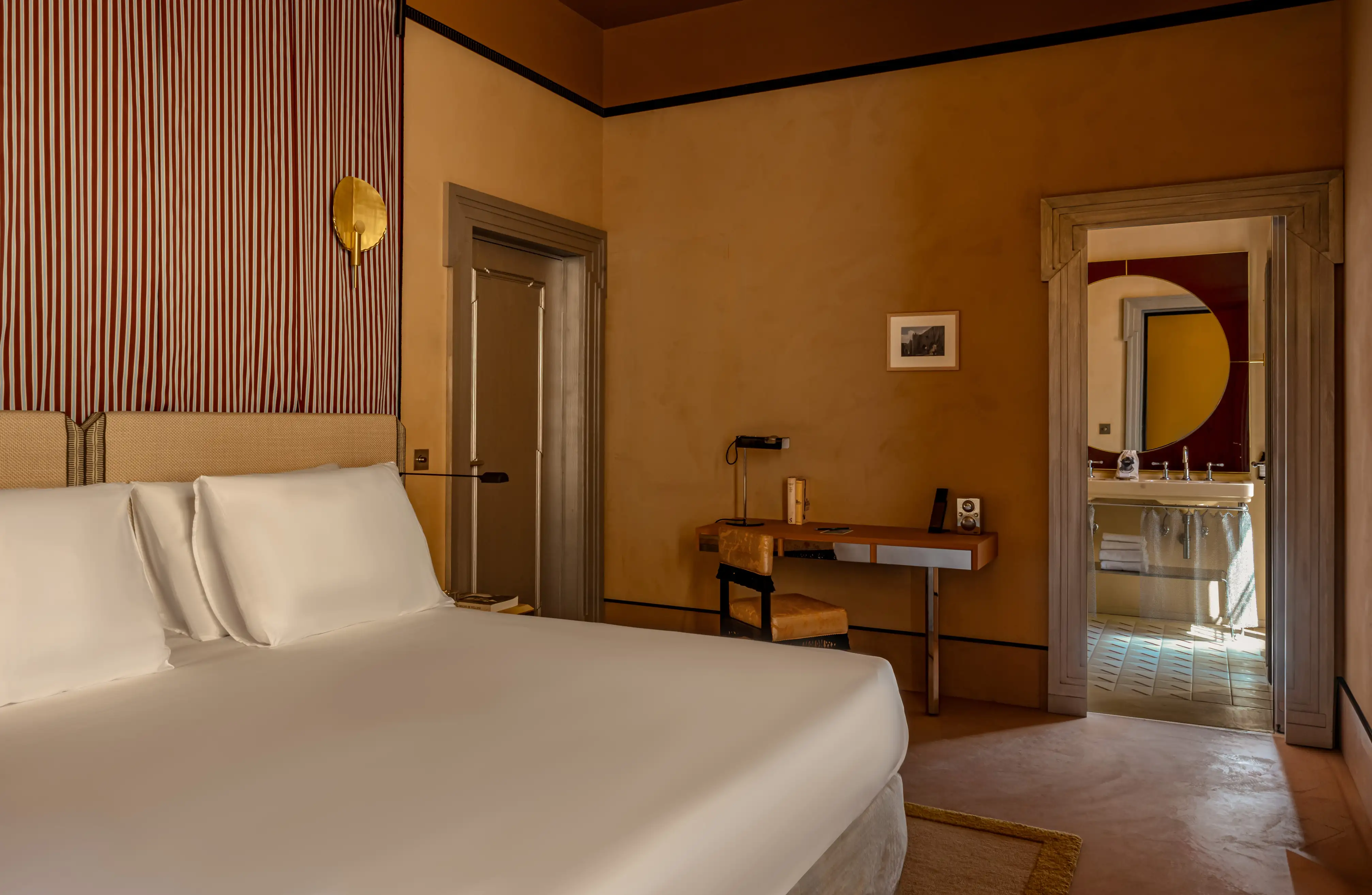 Elegant hotel room interior at Experimental Roma