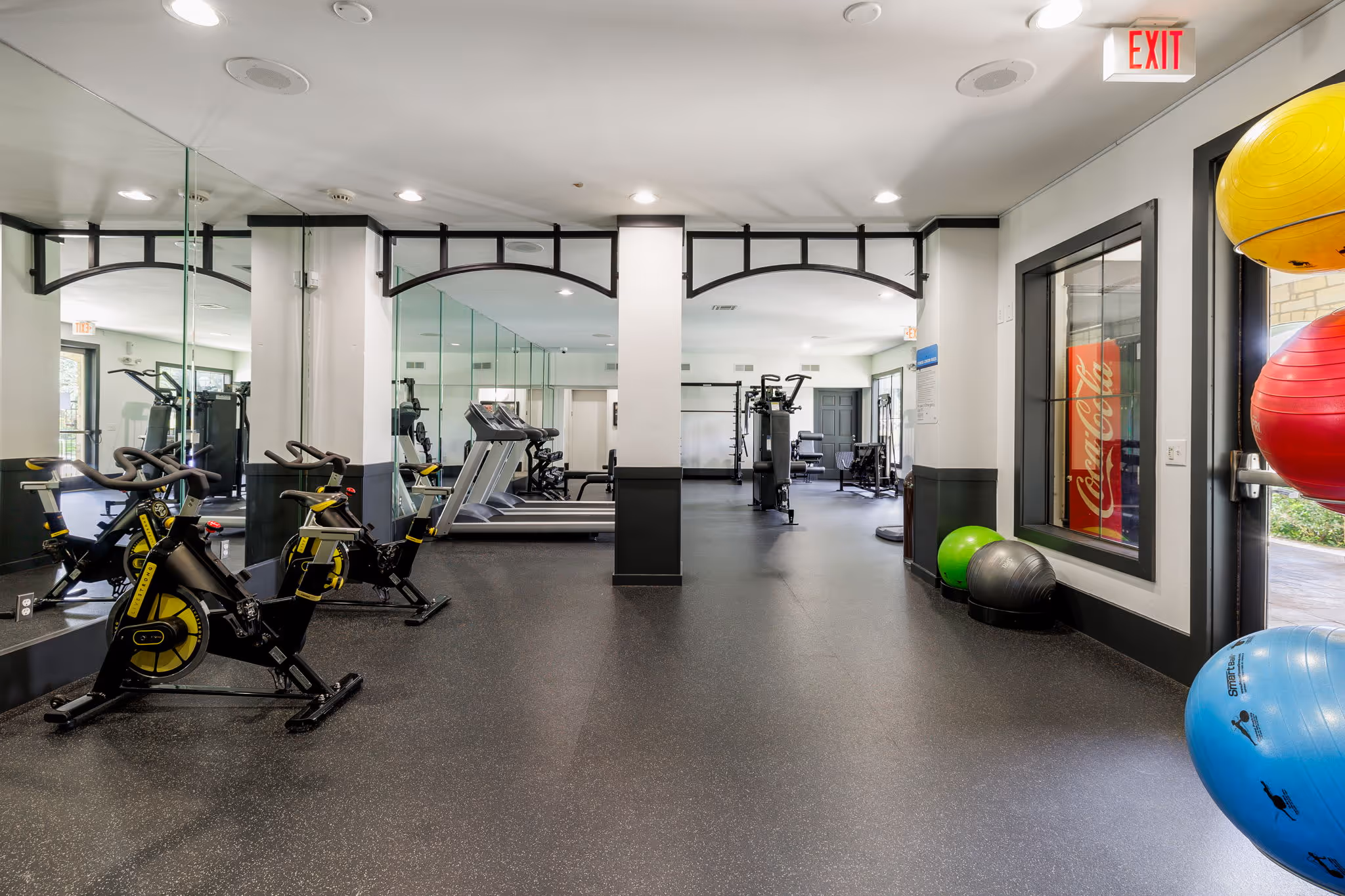 gym with yoga balls and treadmills
