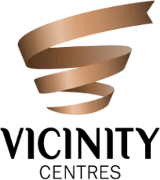 Copper-colored spiral ribbon twisting downward on a transparent background.
