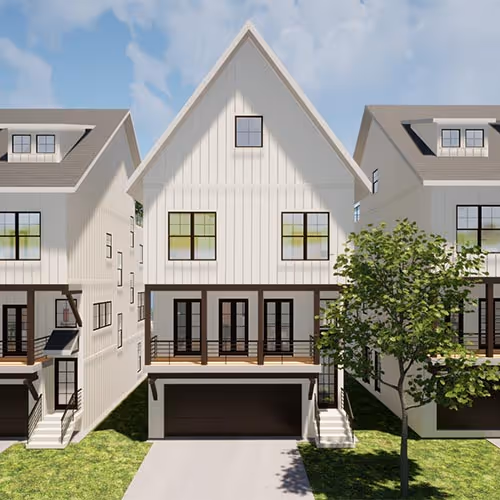Bright living room with a grand piano near large windows, gray armchair, sofa with cushions, a bouquet of flowers on a marble coffee table, and built-in shelves with books and decor.