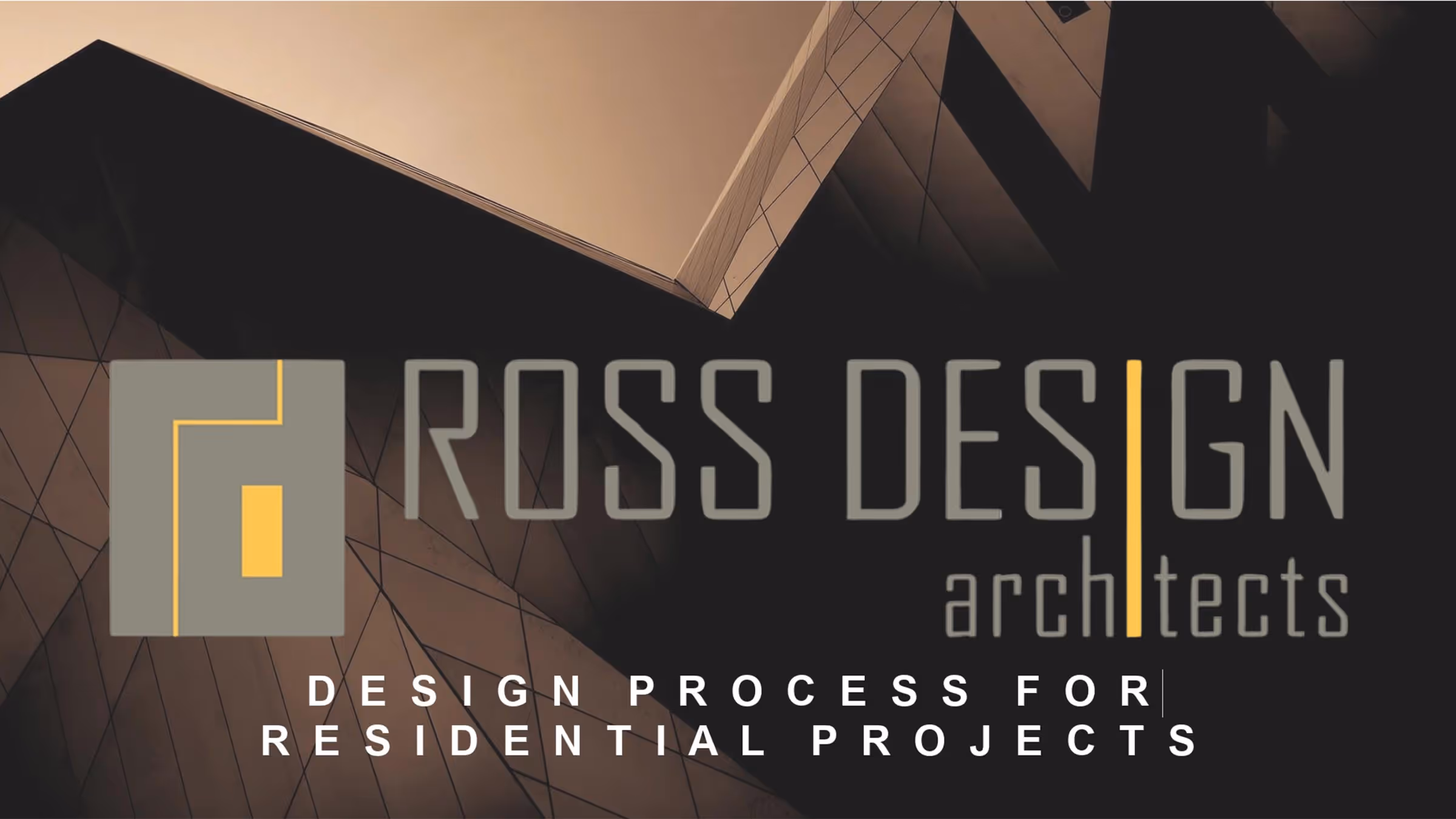 Workspace with a laptop and large monitor displaying architectural floor plans, set against a window showing a green garden outside.