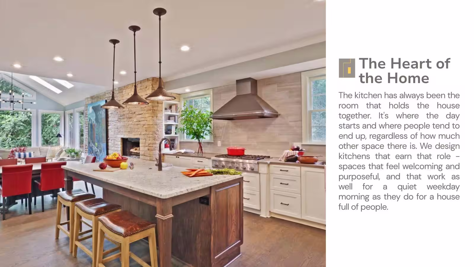 Modern kitchen with wooden dining table, red chairs, white and gray cabinets, wine rack, and a decorative model sailboat.